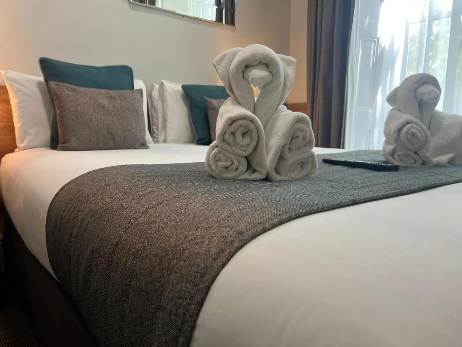 Bed in Tudor Court Hotel