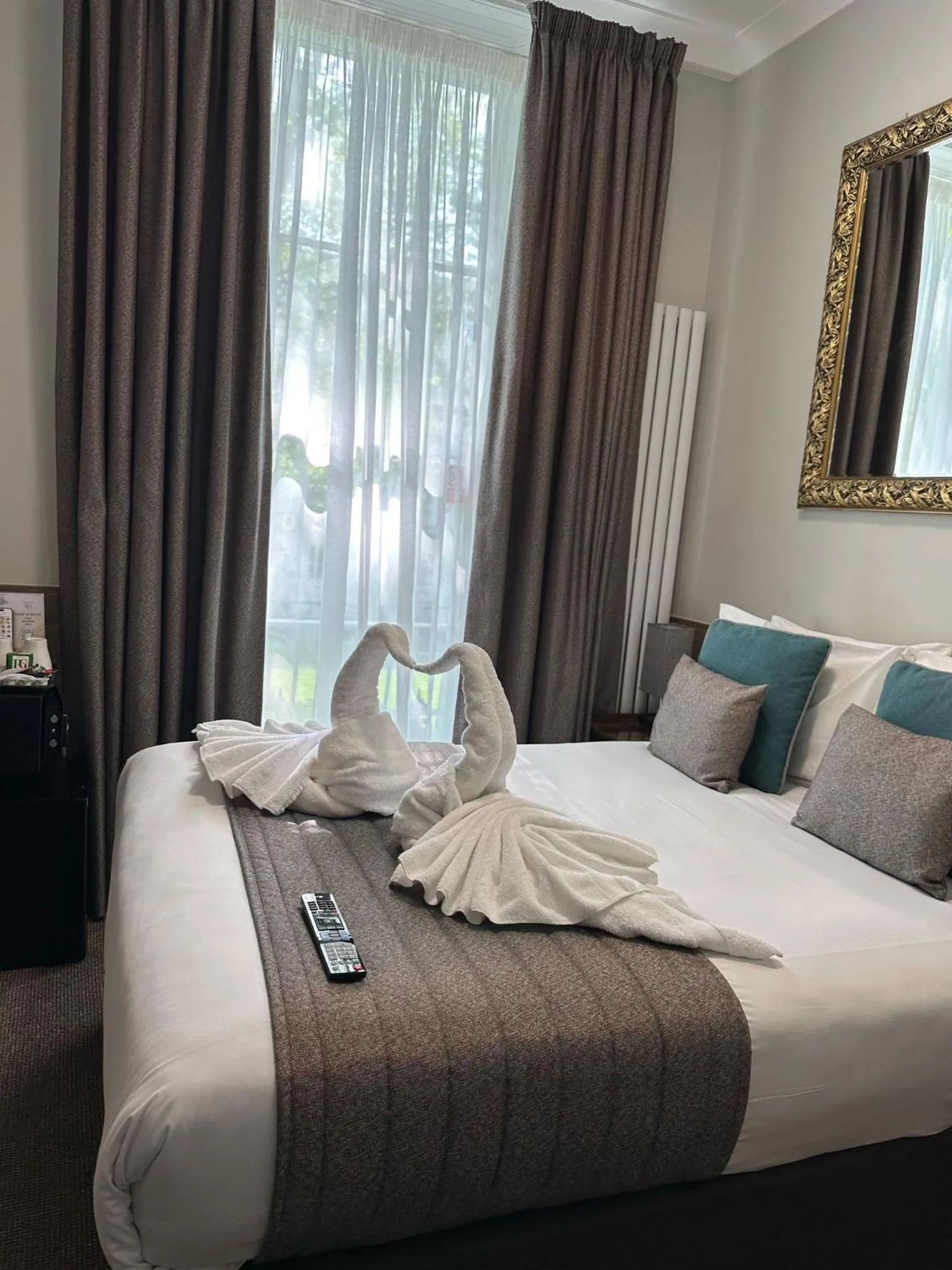 Bed in Tudor Court Hotel