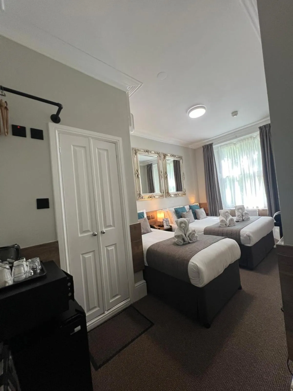 Bed in Tudor Court Hotel