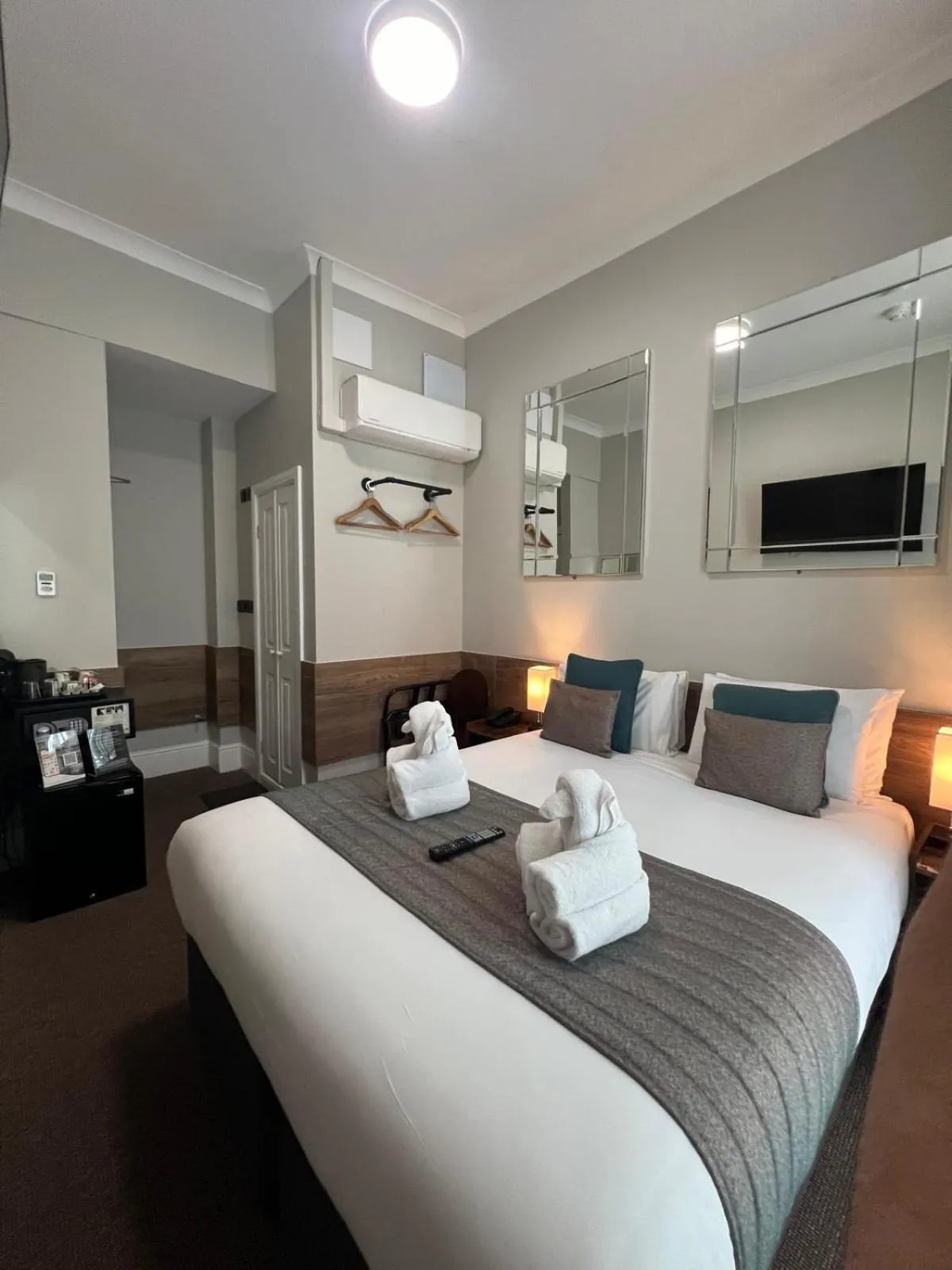 Bed in Tudor Court Hotel