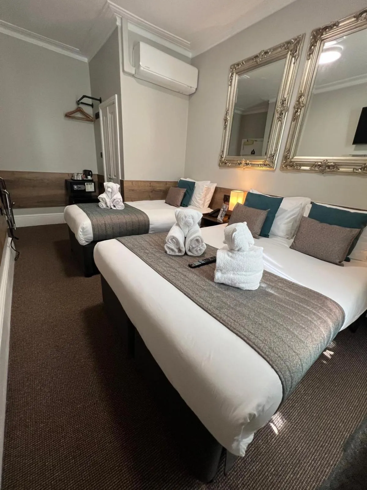 Bed in Tudor Court Hotel