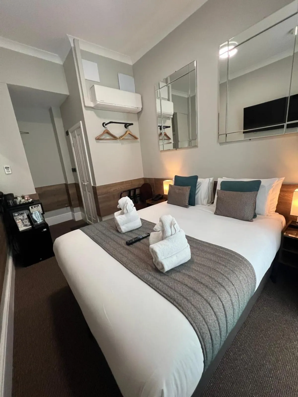 Bed in Tudor Court Hotel