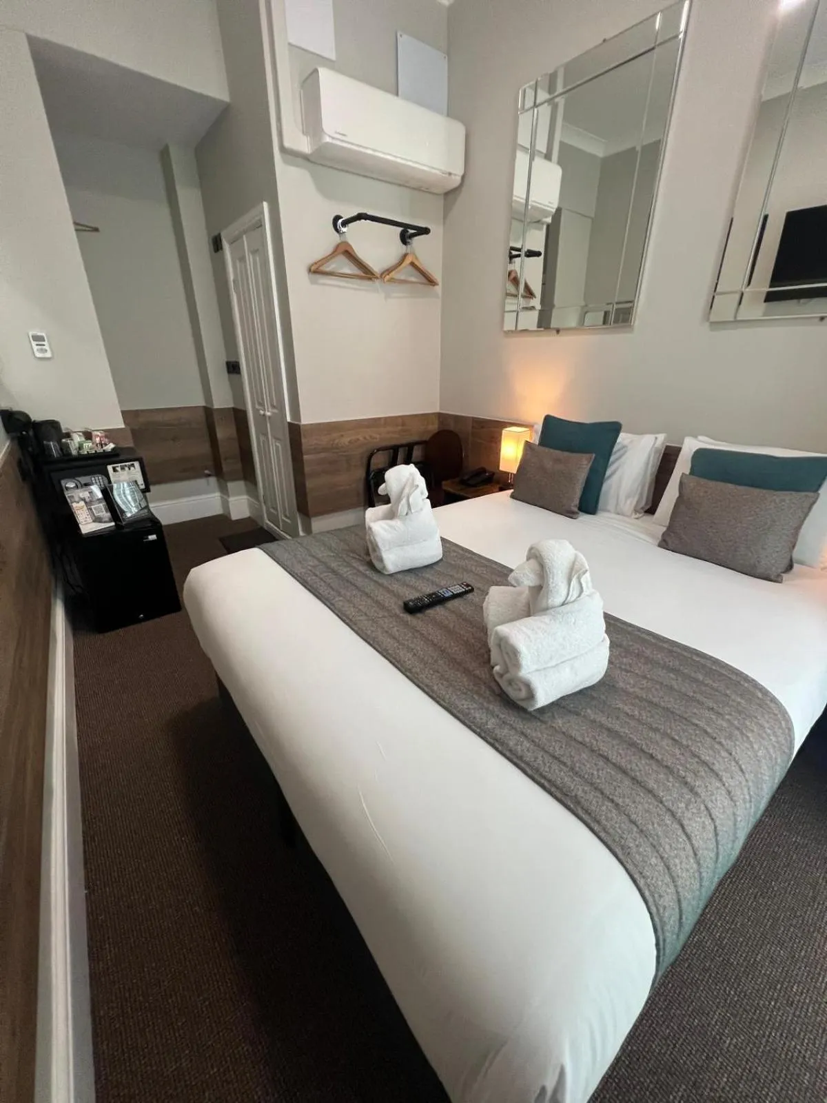 Bed in Tudor Court Hotel