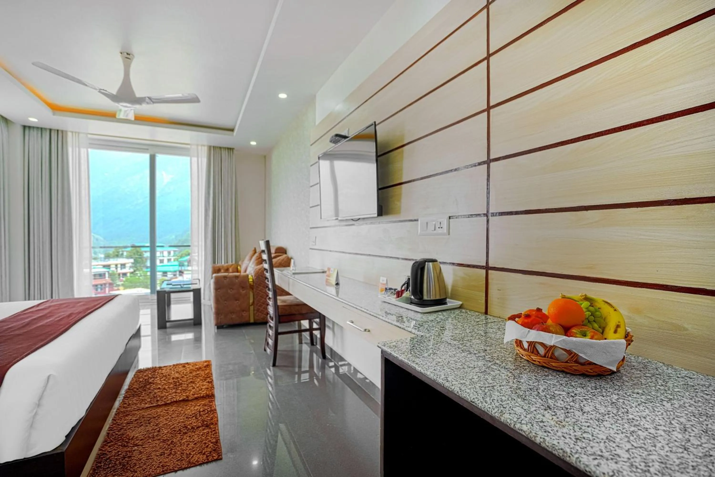 Bed in Aliza Inn And Suites By SRS Hotels