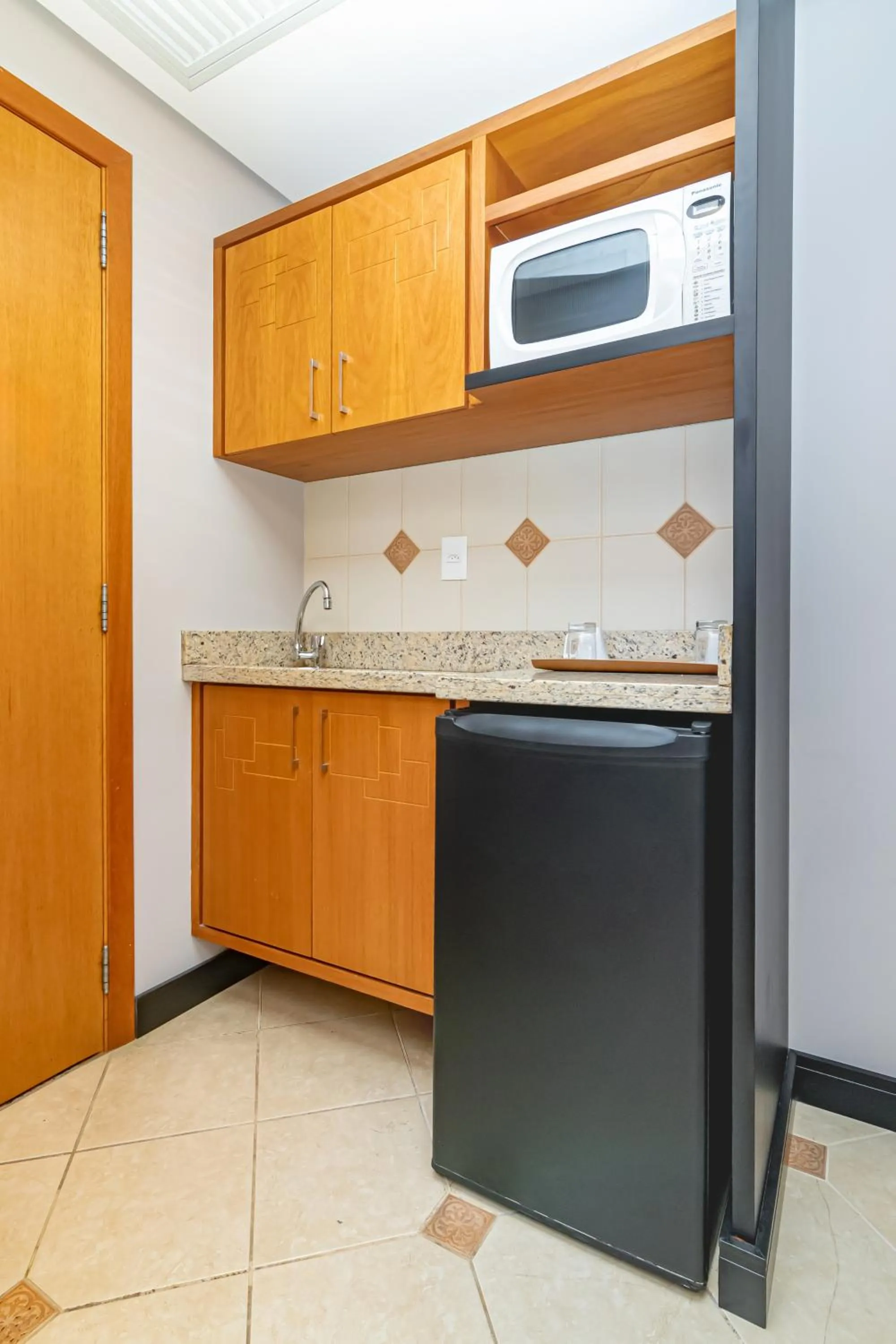 Kitchen or kitchenette in Mercure Florianópolis