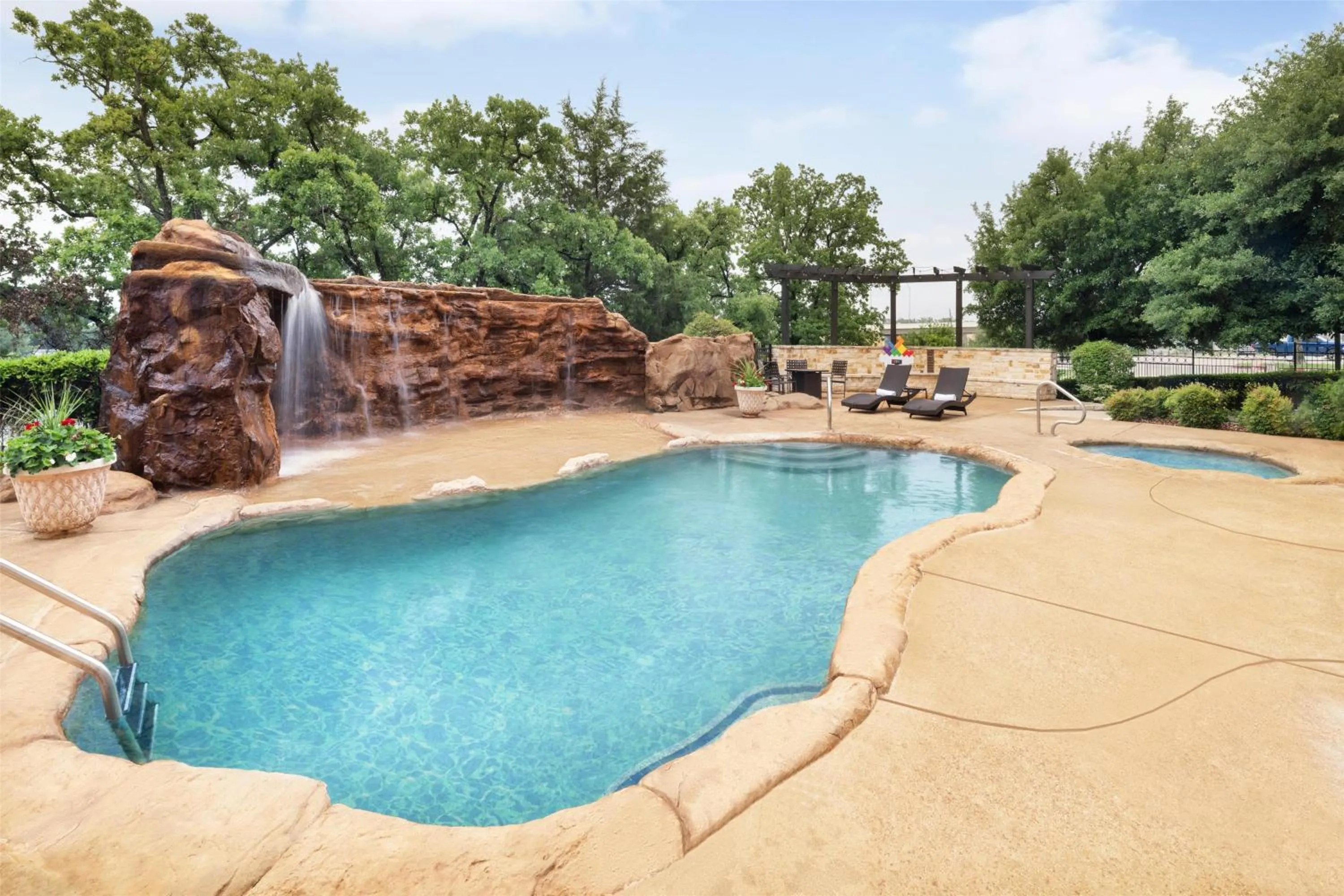 Pool view in Best Western Premier Crown Chase Inn & Suites