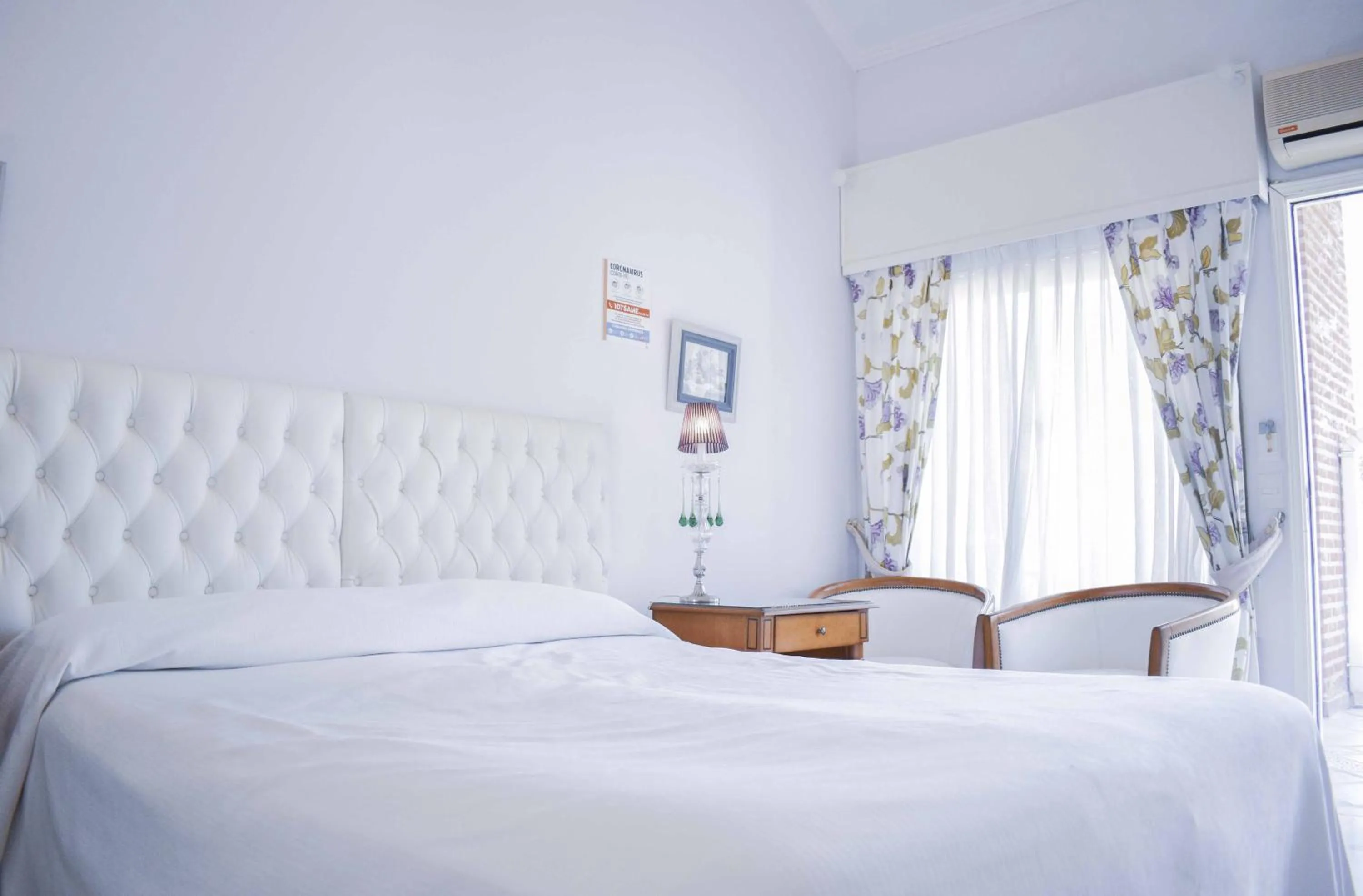 Bed in Posada Suiza by Prima Collection