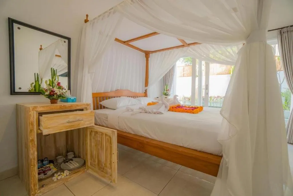 Bed in Kubu Guest House