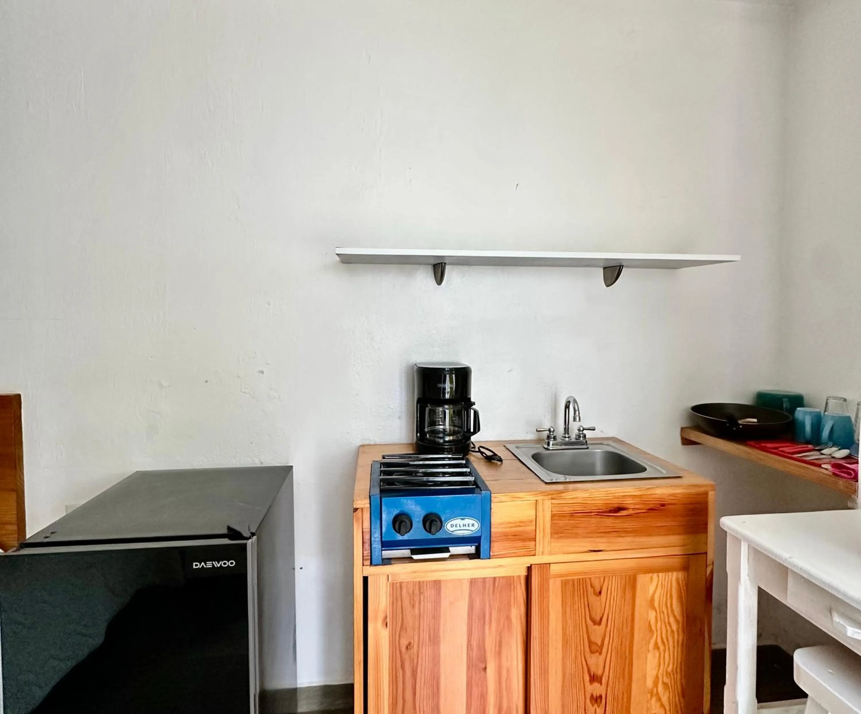 Kitchen or kitchenette in La Etelvina Suites