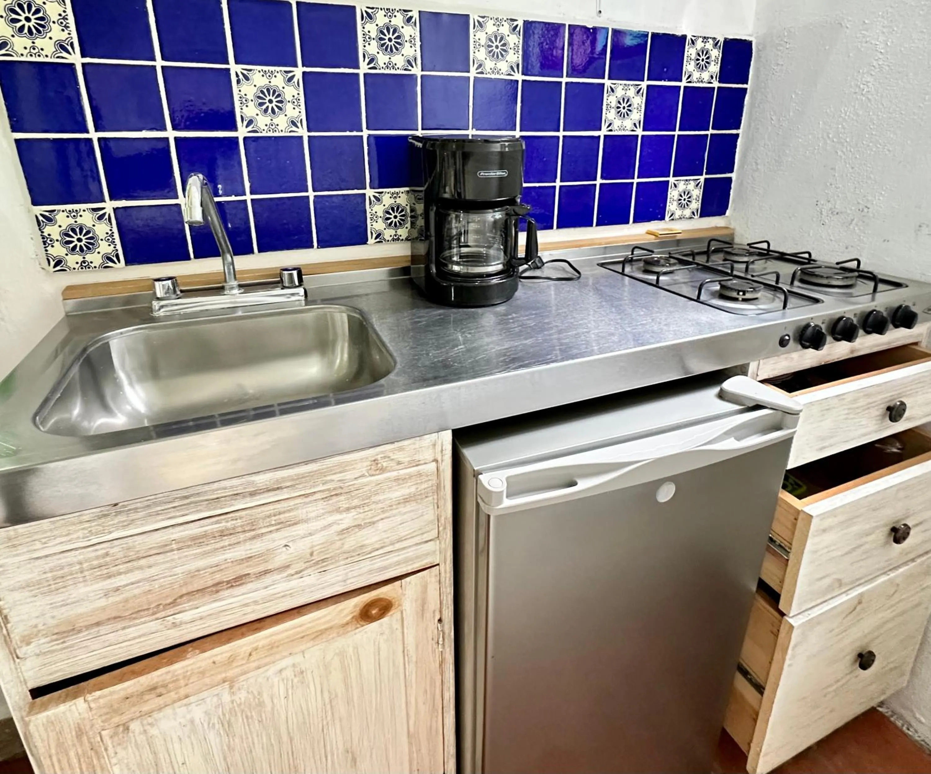 Kitchen or kitchenette in La Etelvina Suites