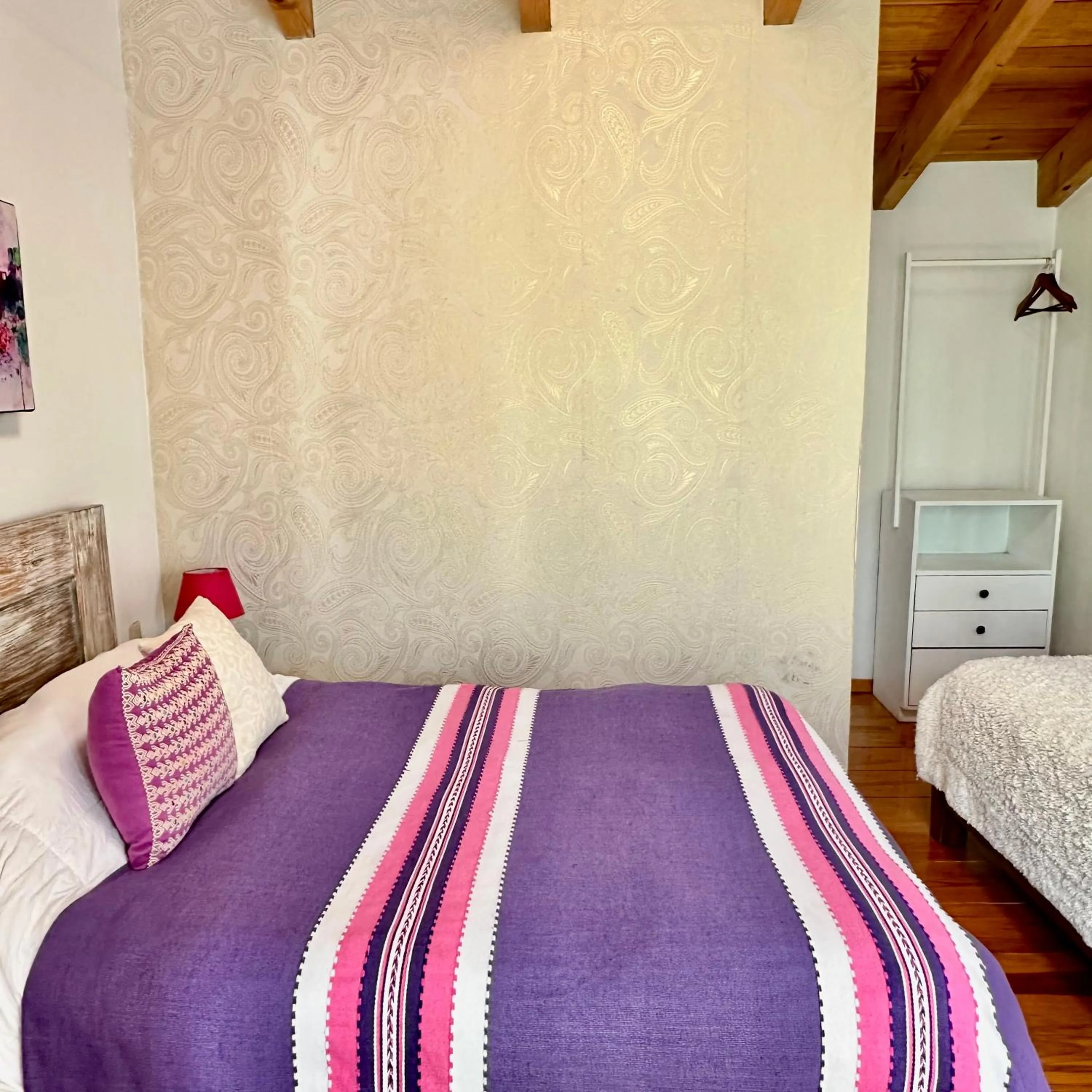 Bed in La Etelvina Suites