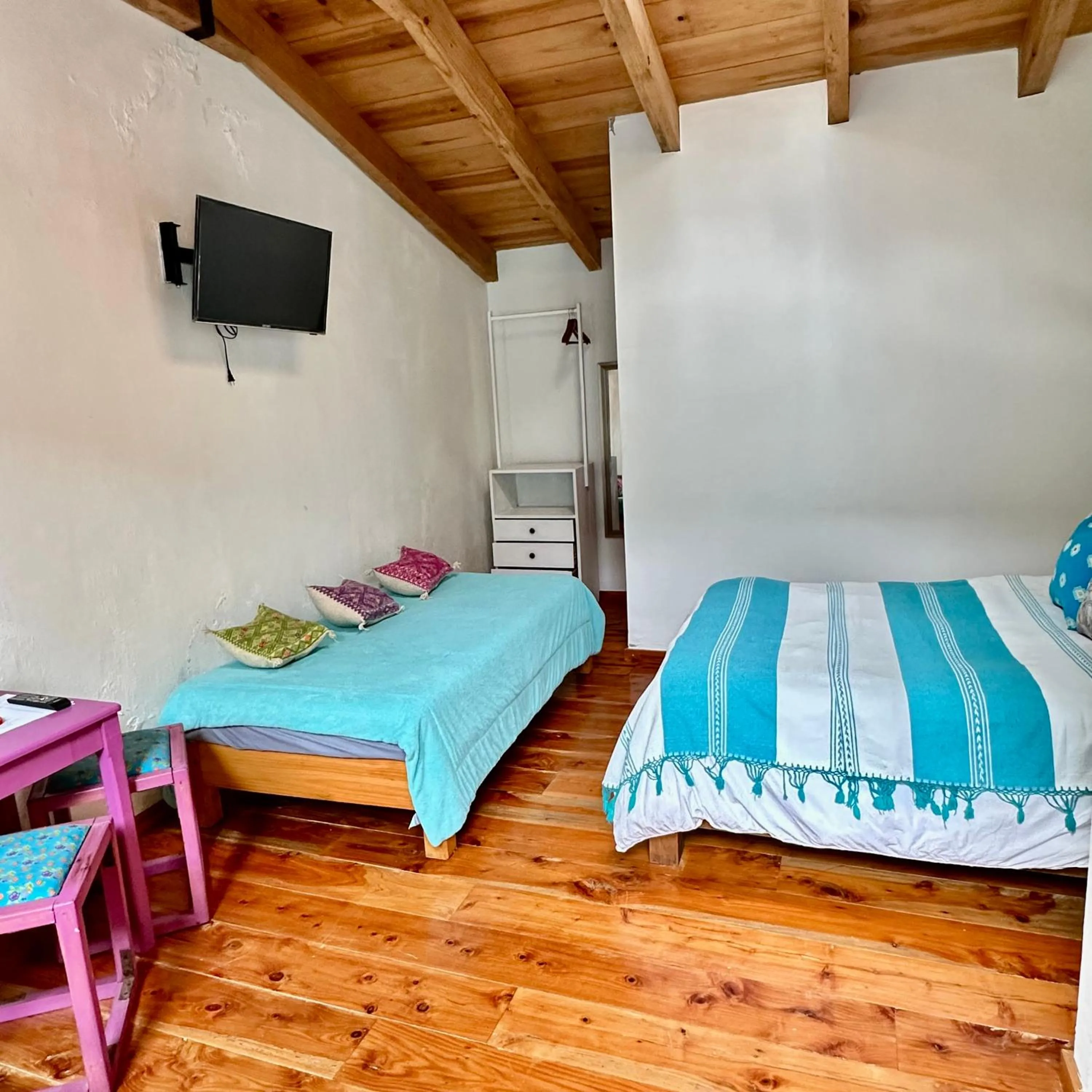 Bed in La Etelvina Suites