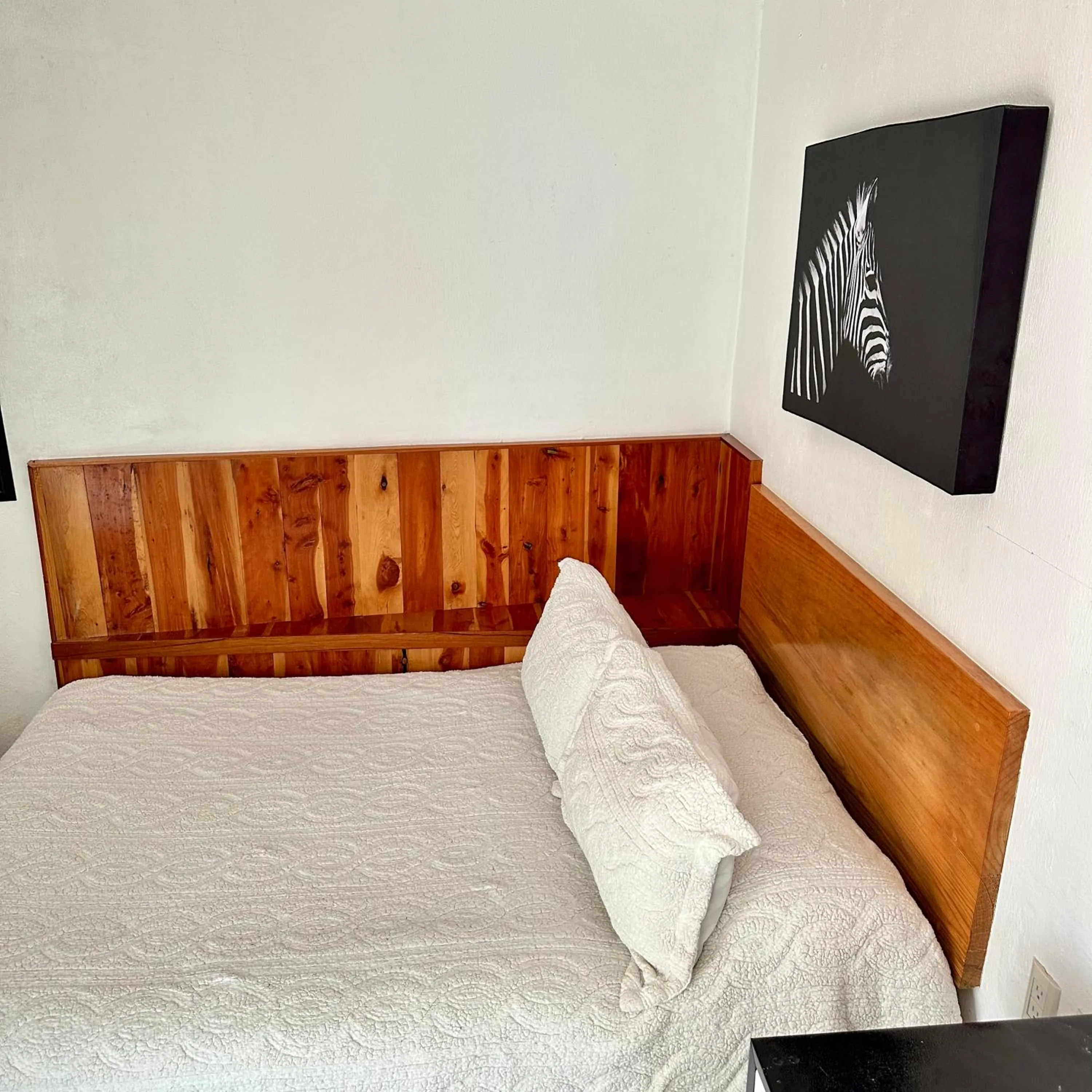 Bed in La Etelvina Suites
