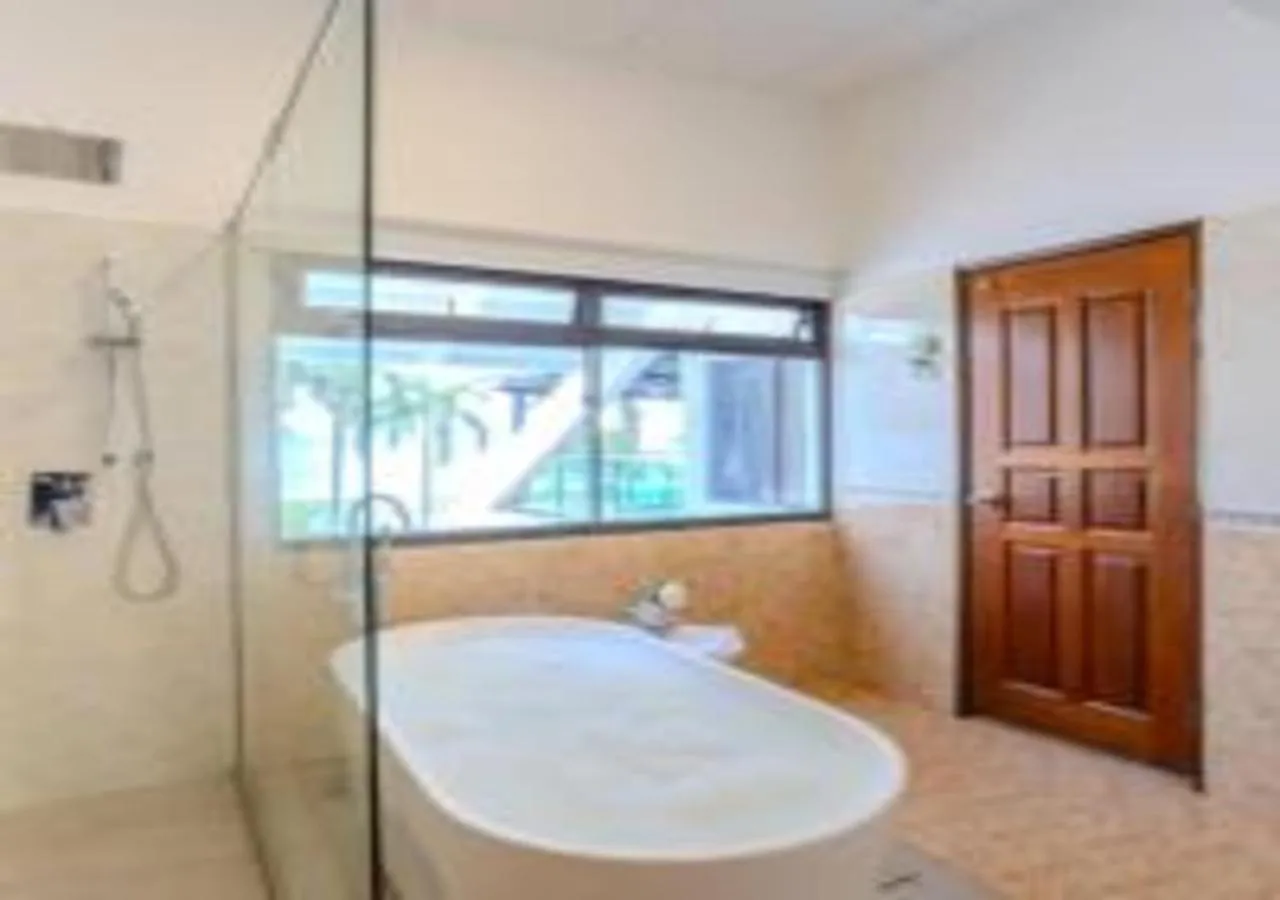 Bathroom in Suntai Villa, Beachfront Suites