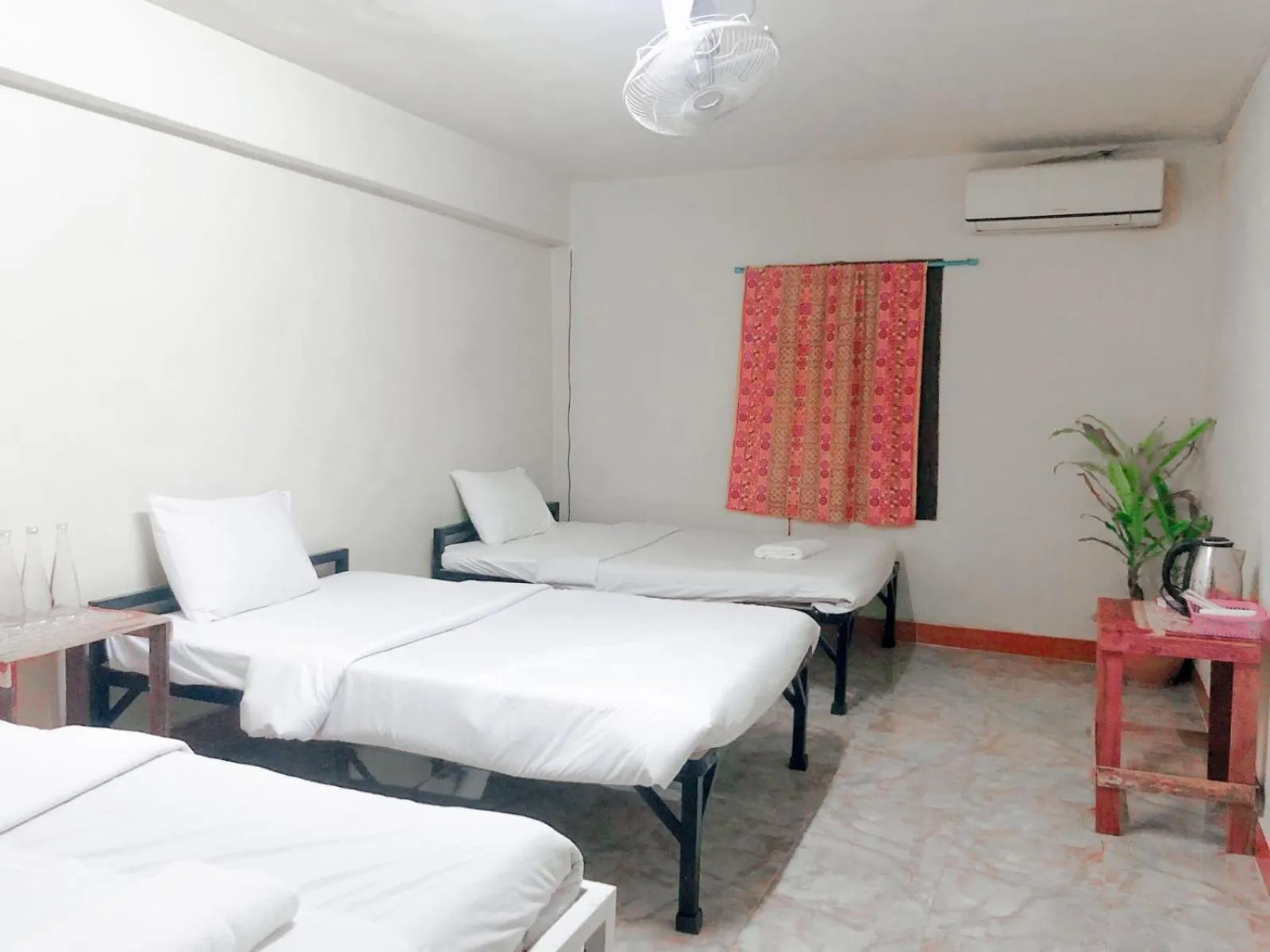 Bed in Tingkham Guesthouse