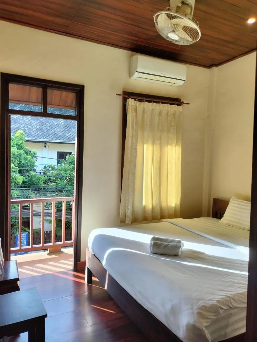 View (from property/room), Bed in Tingkham Guesthouse