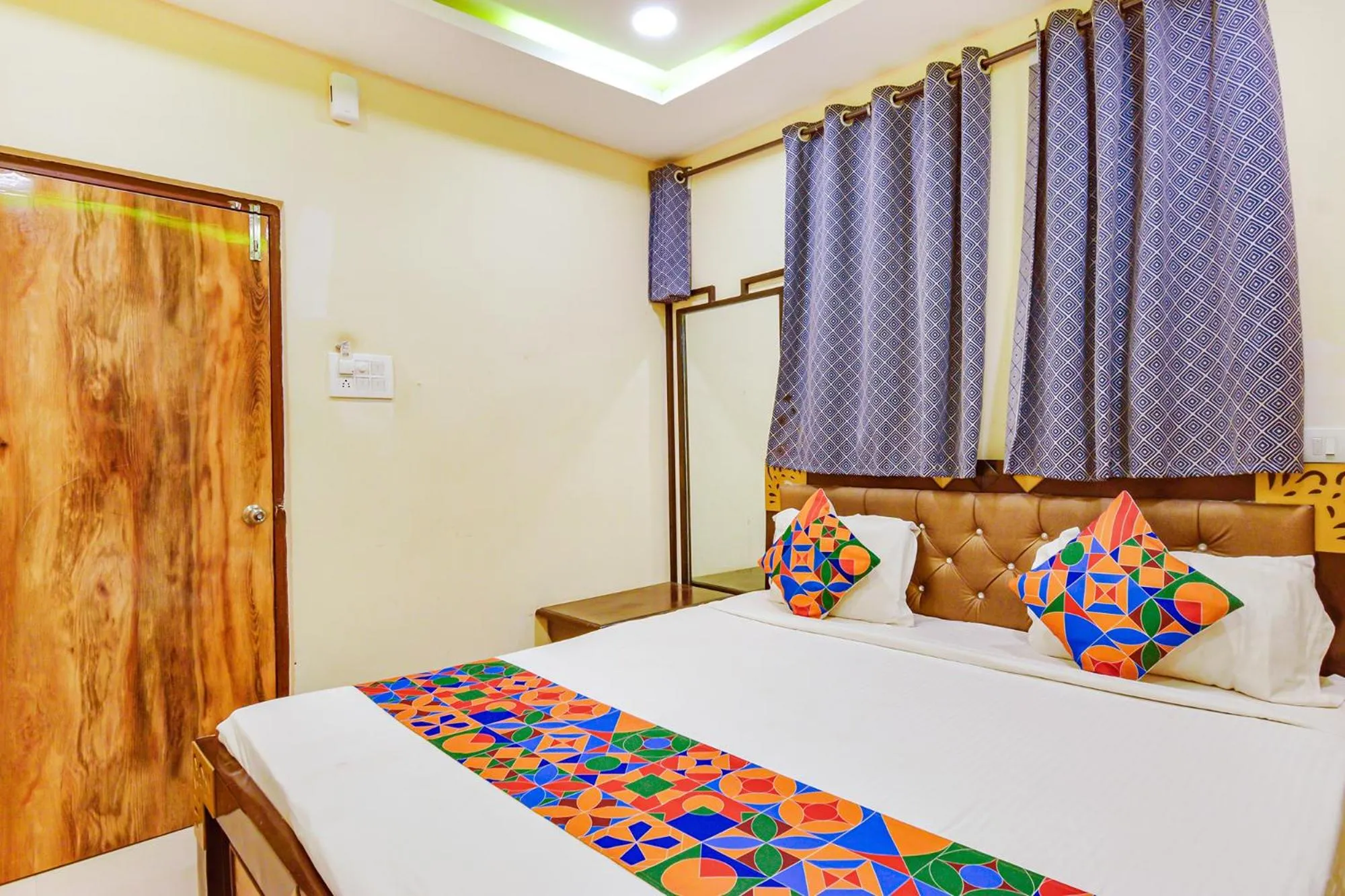 Bed in FabHotel Yogeshwara Grand - Nr Hyderabad International Airport, Shamshabad