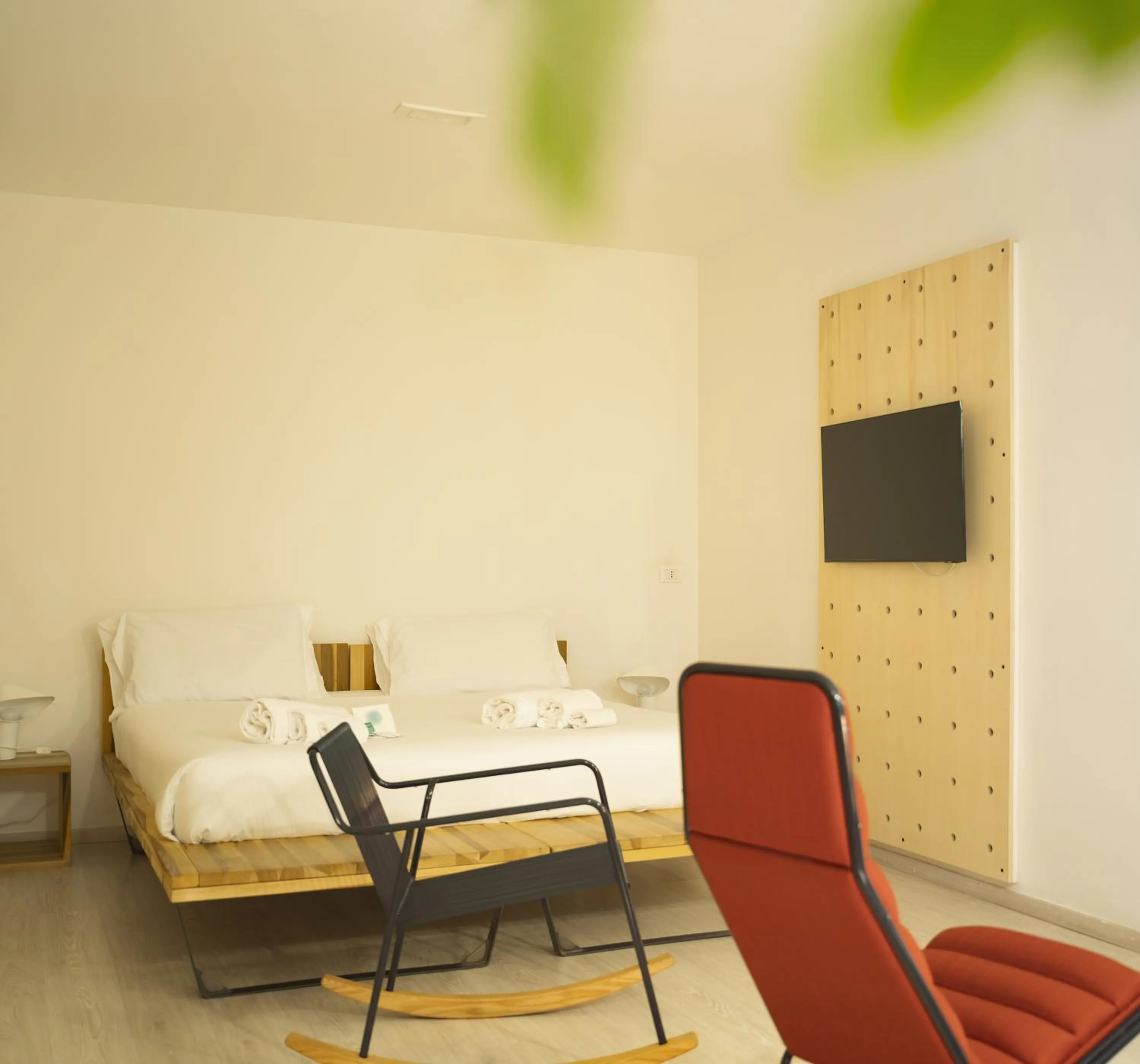 Bed in Imago Plus Hotel