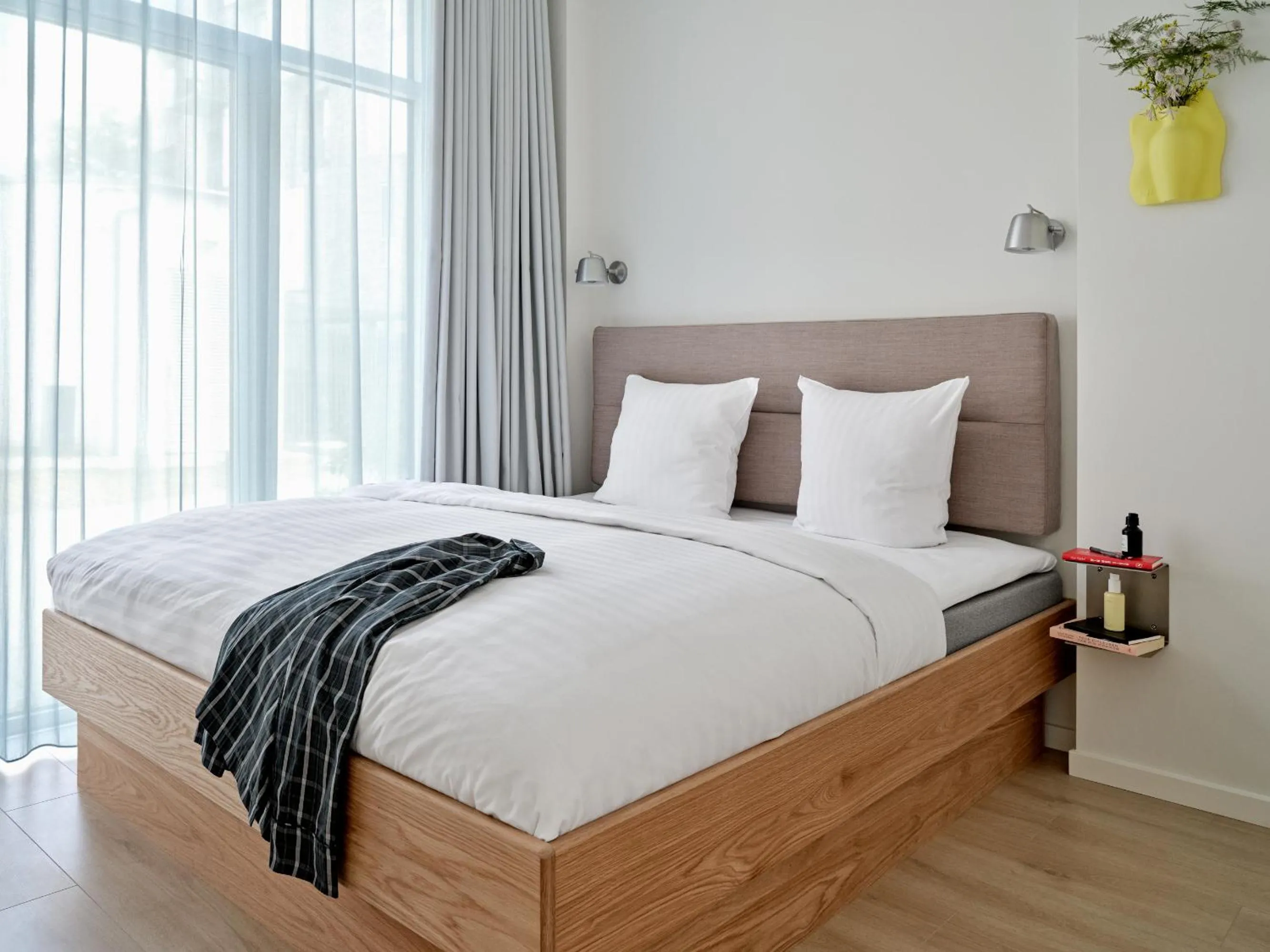 Bed in Flora Apartment Hotel