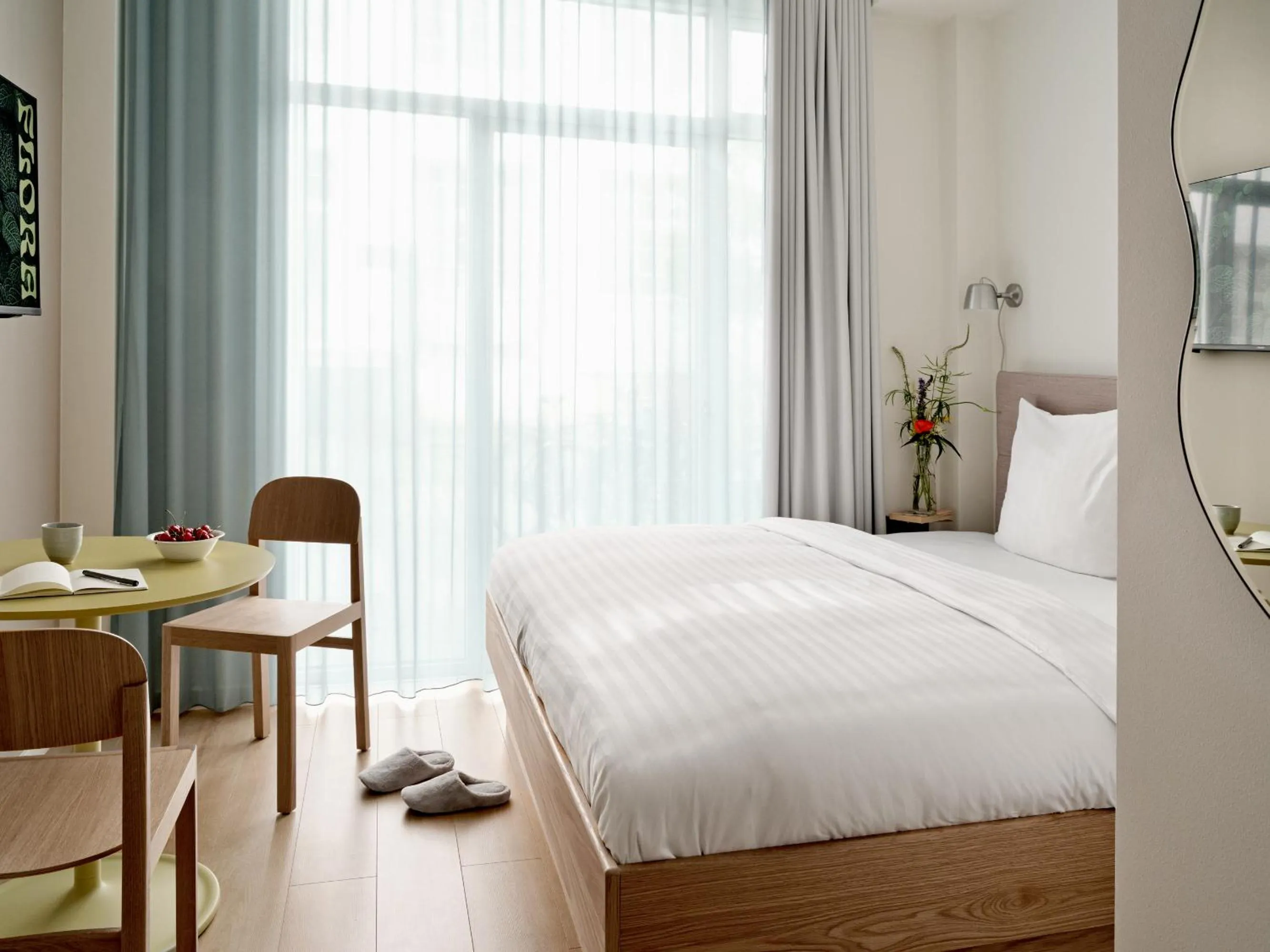 Bed in Flora Apartment Hotel