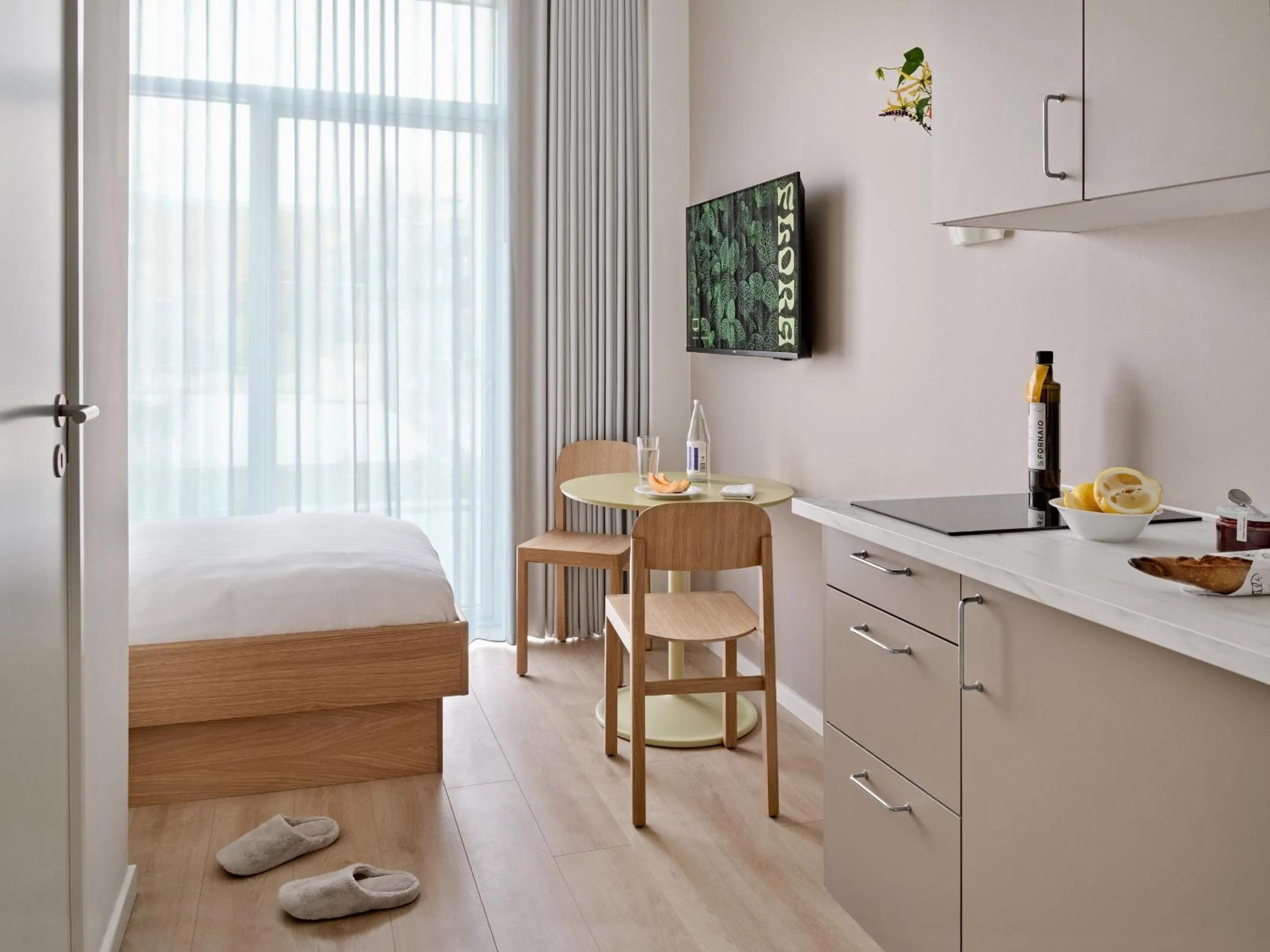 Bed in Flora Apartment Hotel