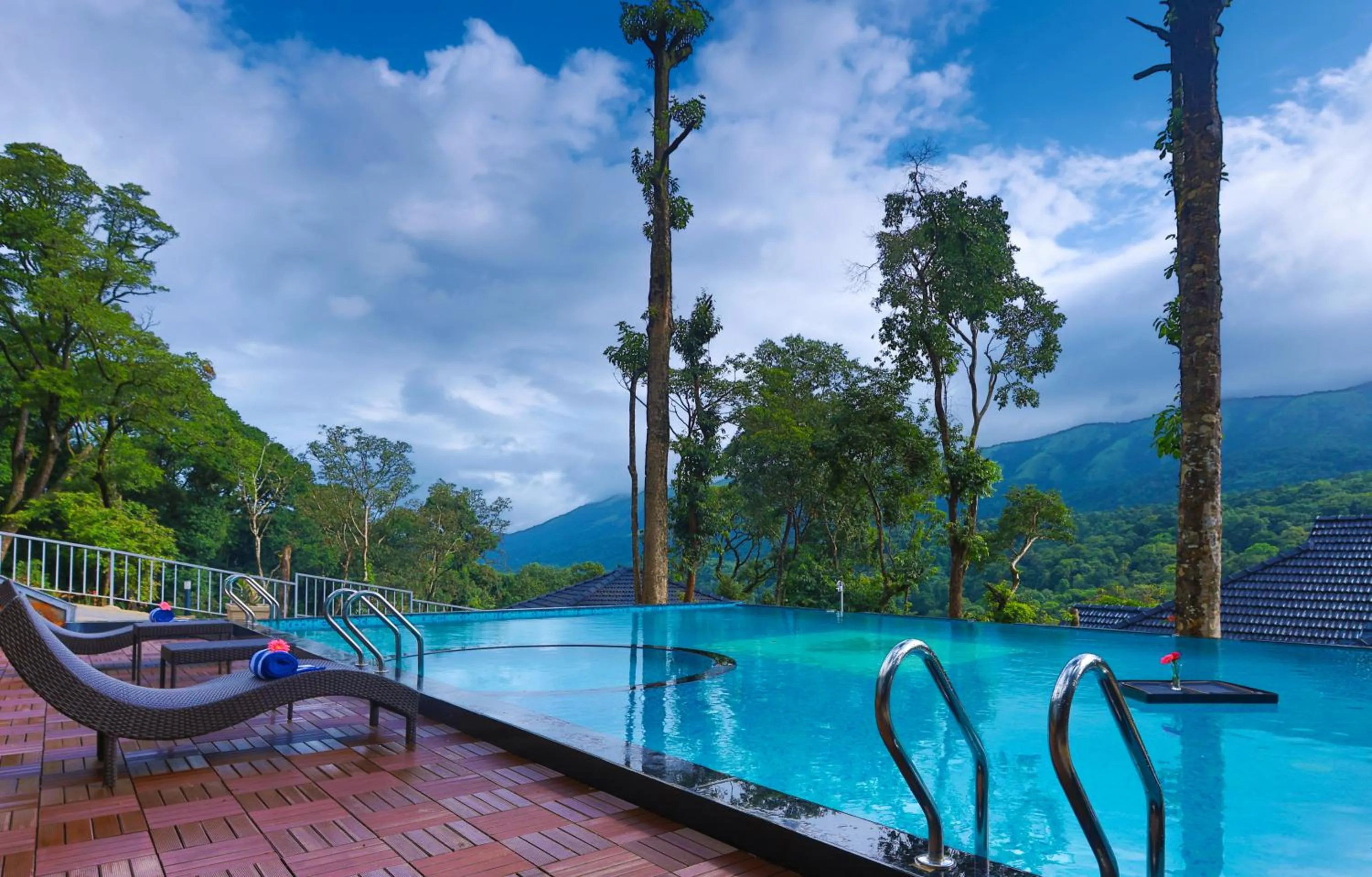 Swimming pool in Silent Brook Resort - Coorg
