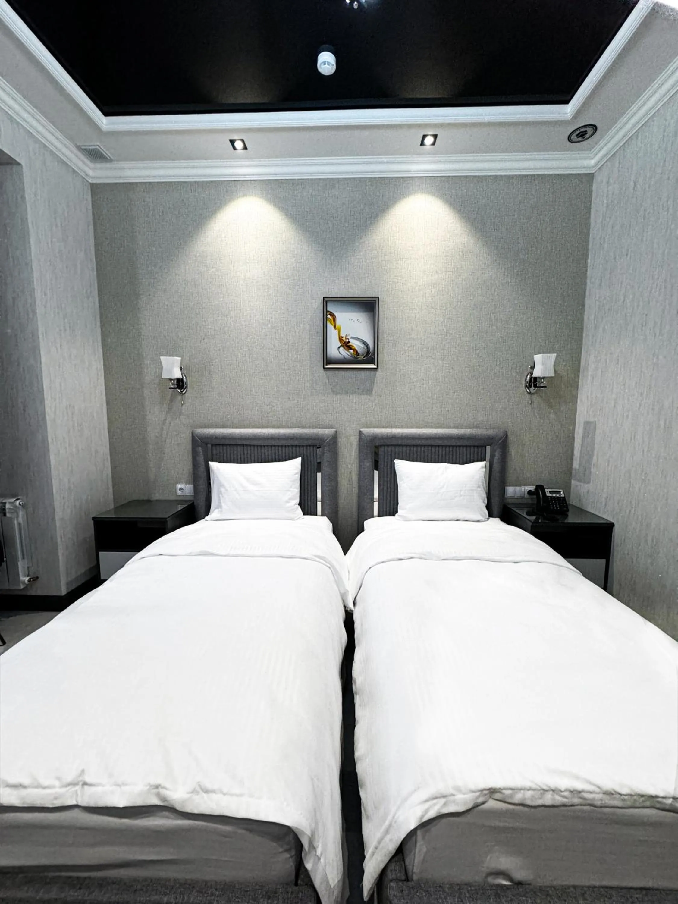 Bed in De Villa Hotel