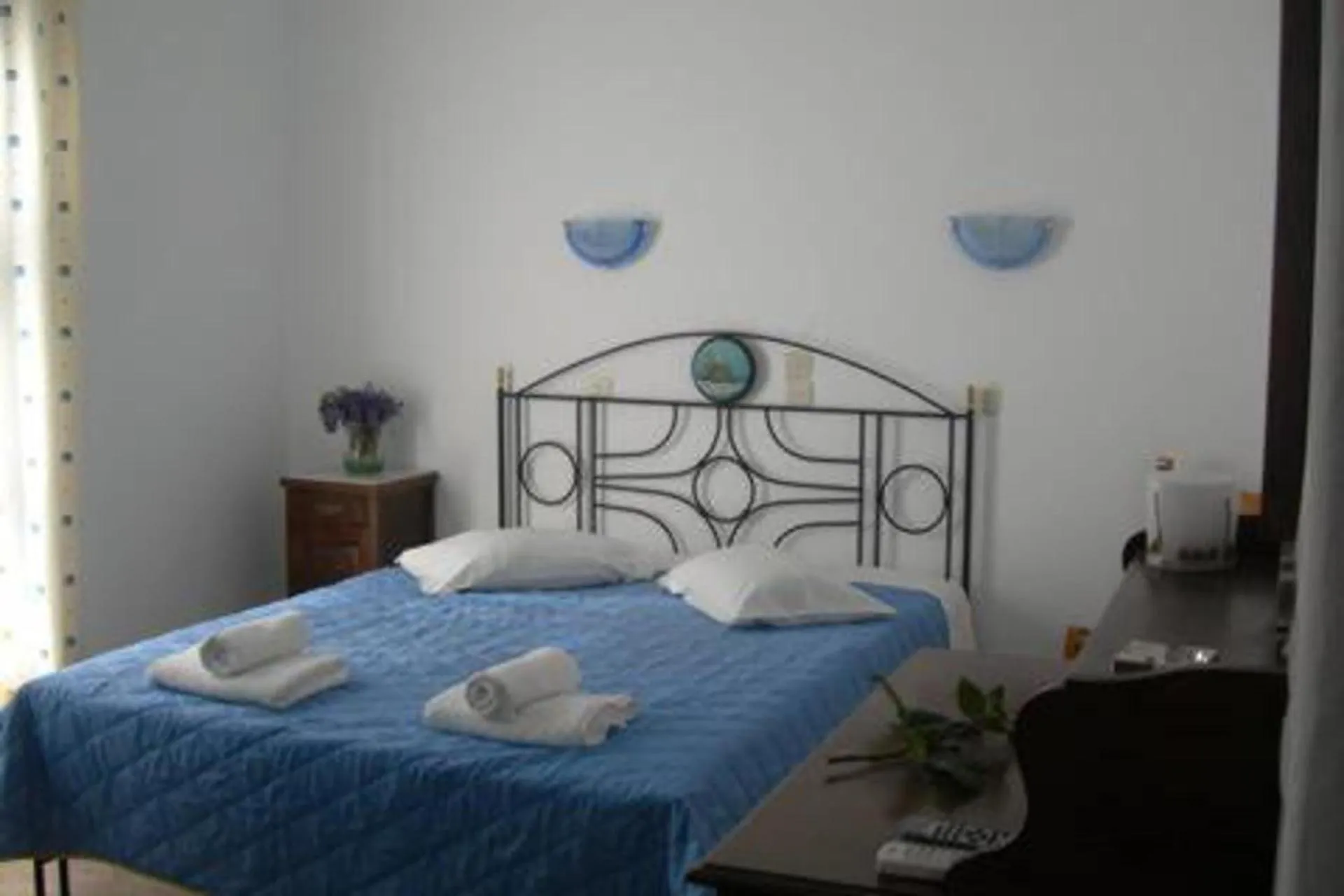 Bed in Verykokkos Pension I