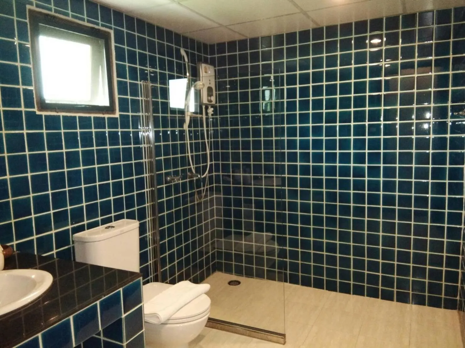 Shower in Scent of Sukhothai Resort