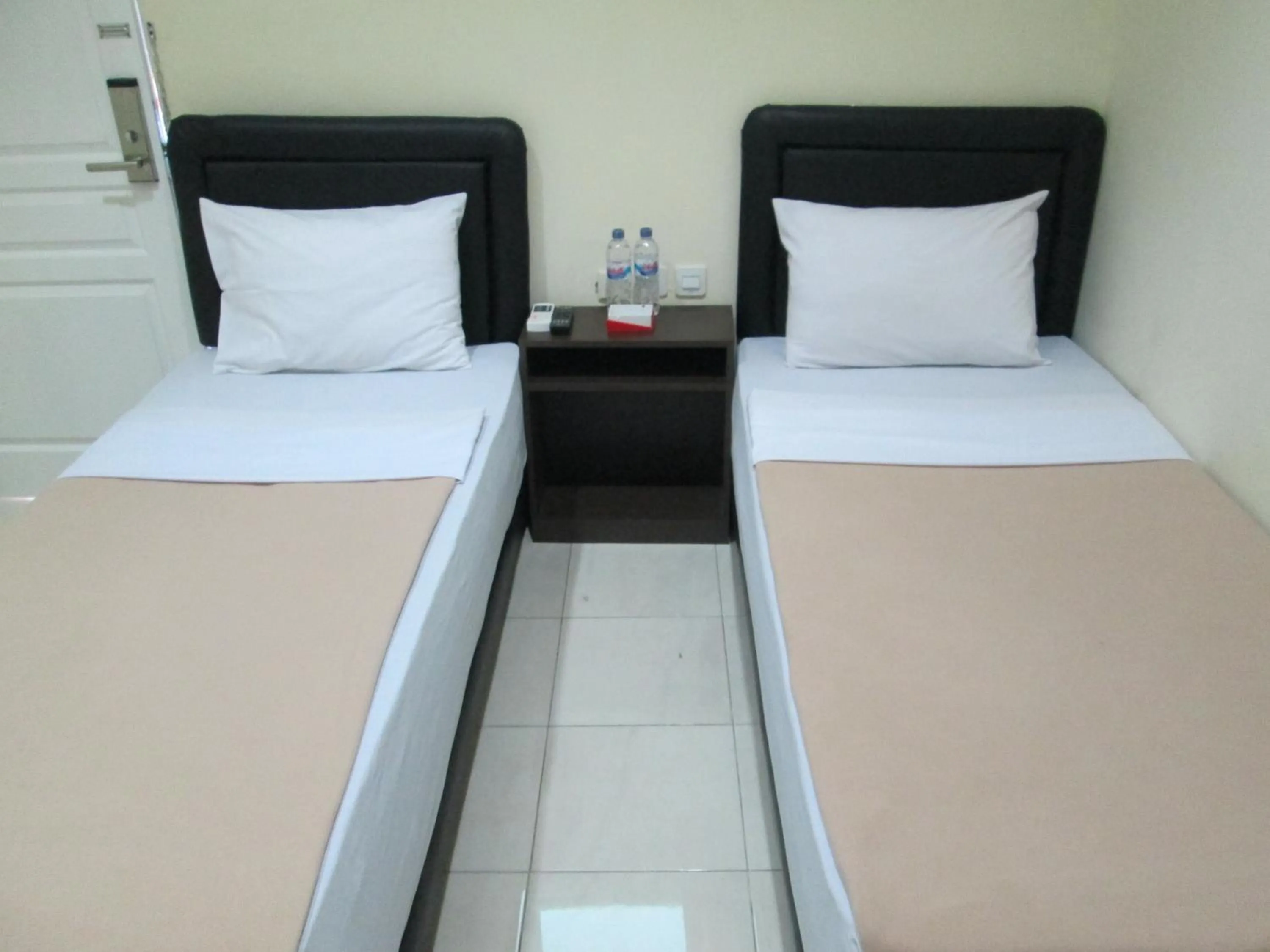 Bed in Mahkota Hotel