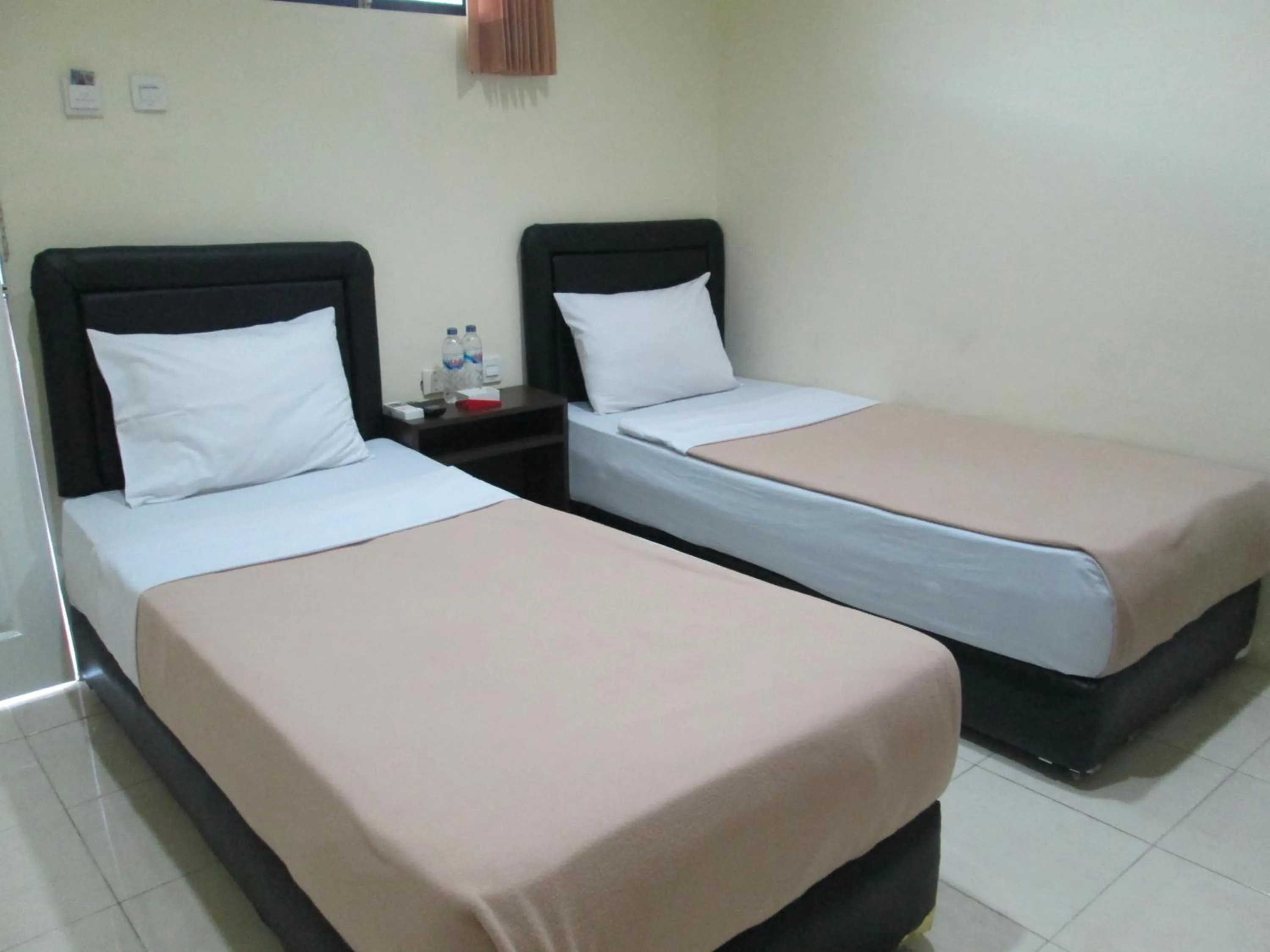Bed in Mahkota Hotel