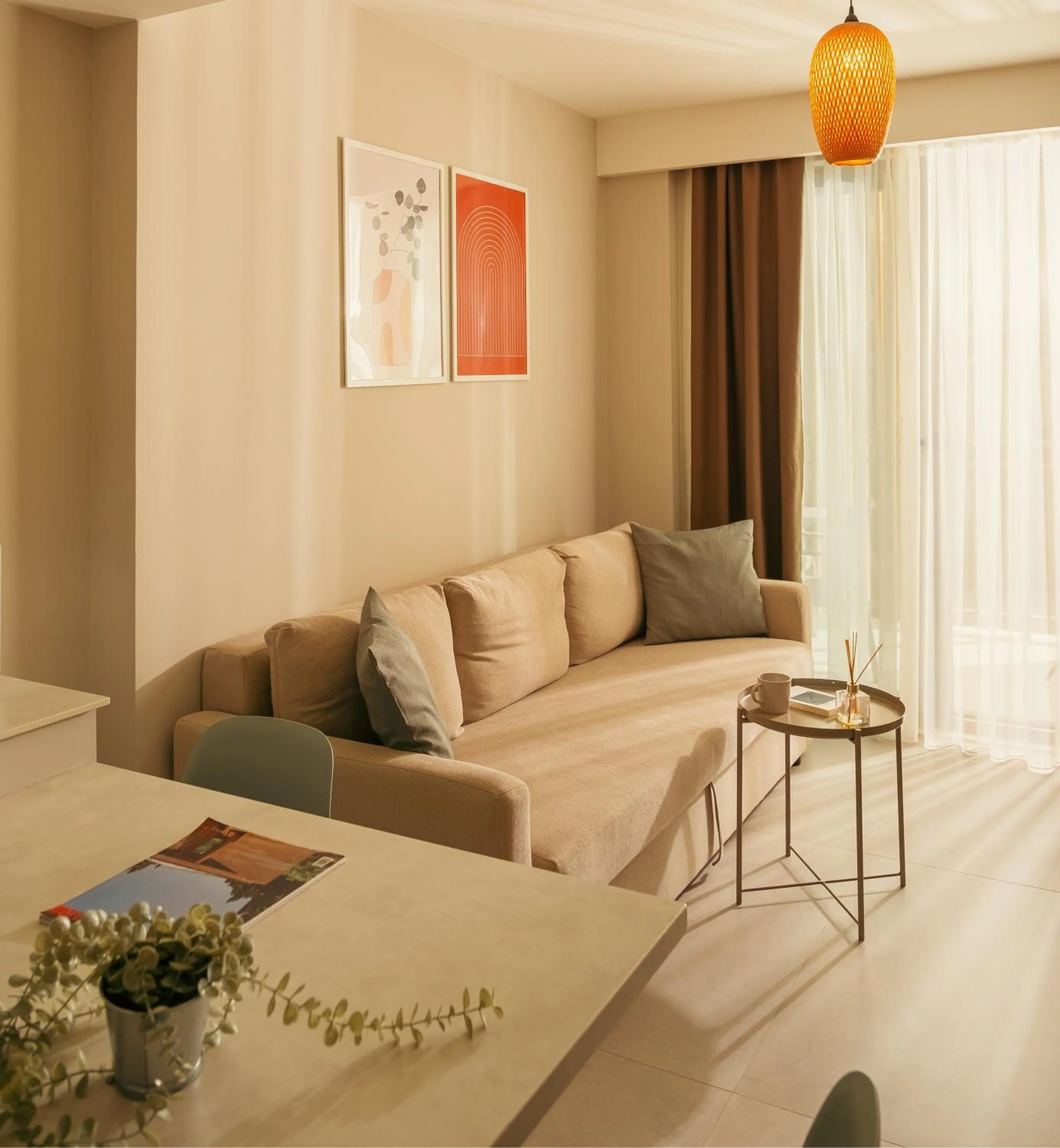 Living room, Bed in Bomo Suites