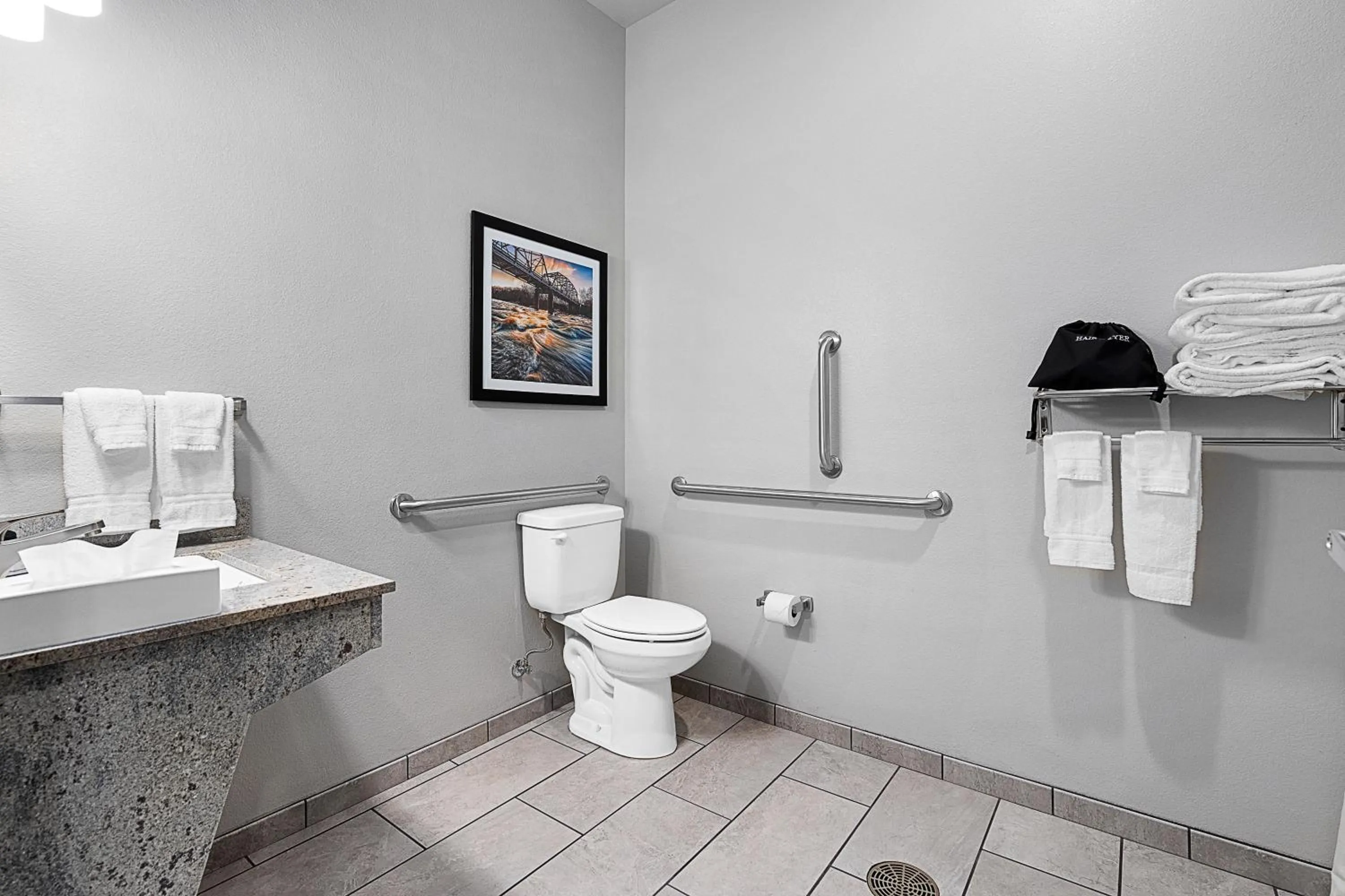 Toilet in Riverstone Suites by Cobblestone Hotels - Chippewa Falls