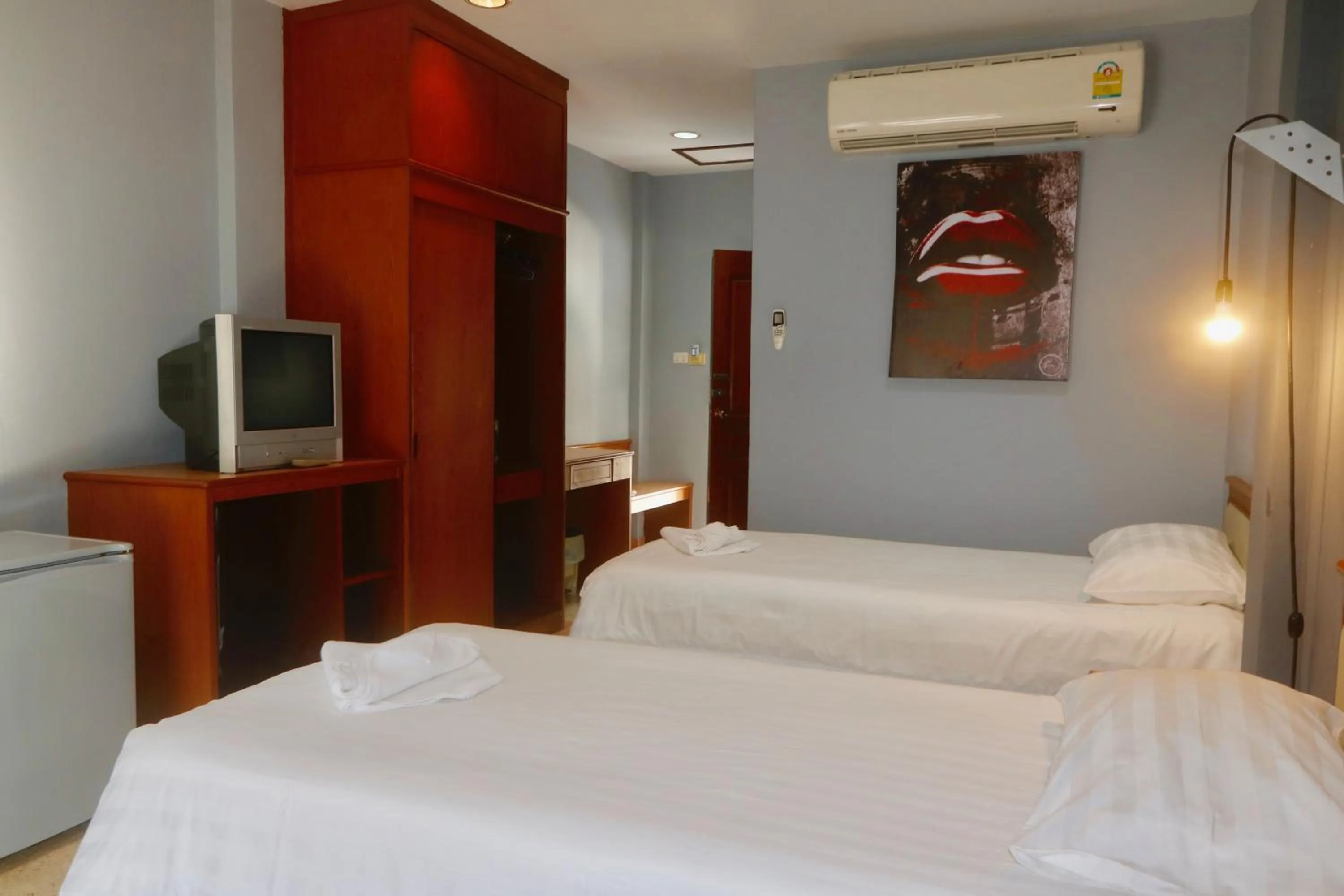 Bed in Momento Resort