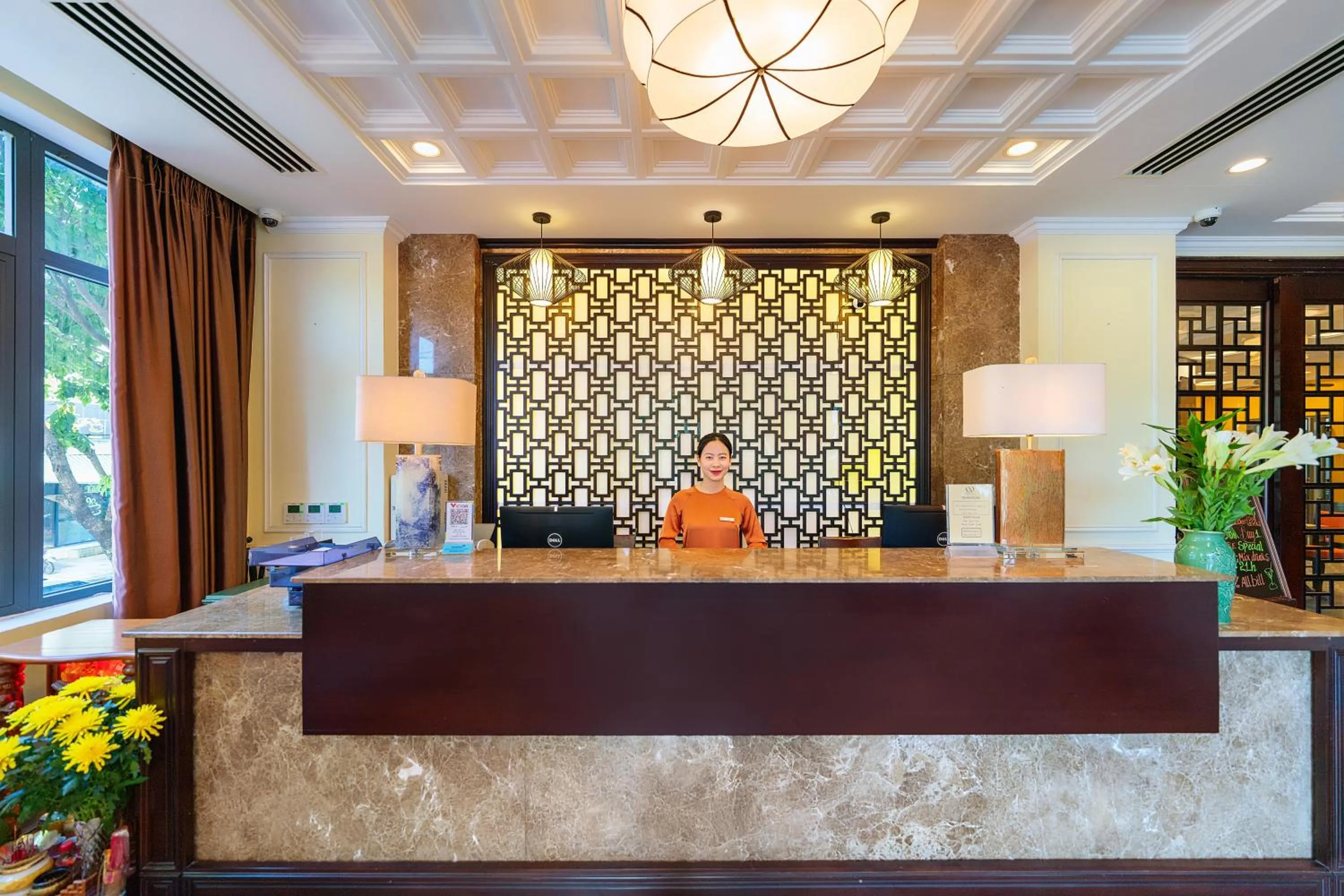 People in Qualia De Hôtel Hoi An - Rooftop Bar City View