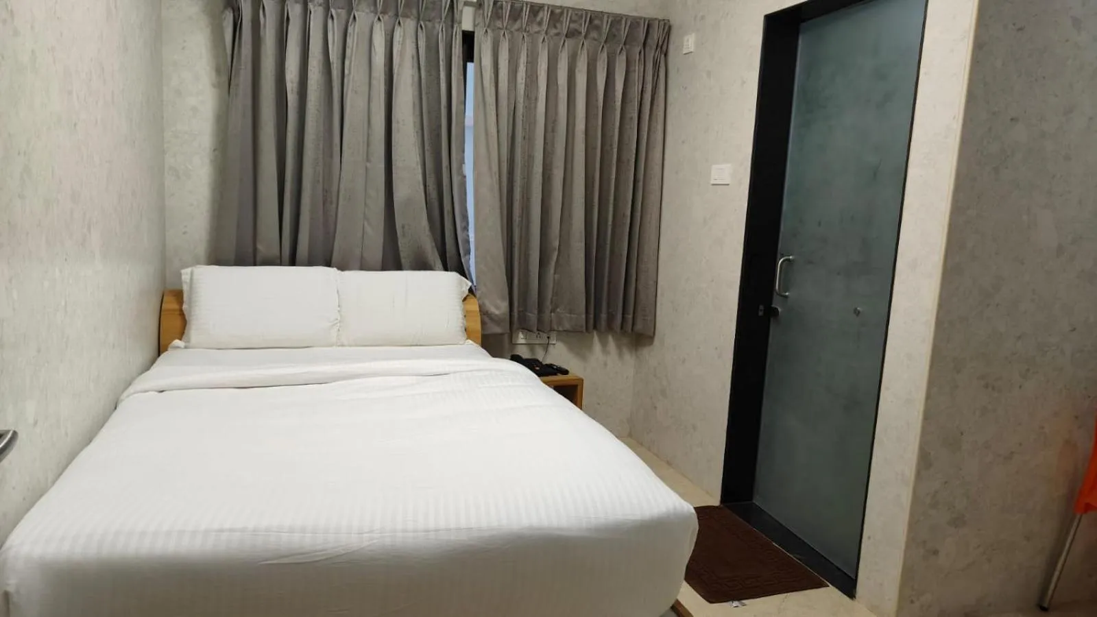 Bed in Arasan Residency