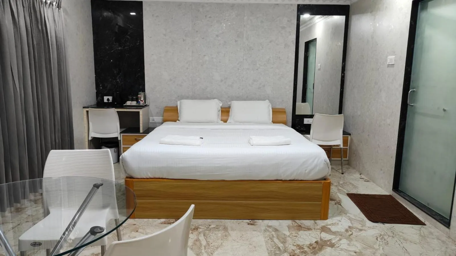 Bed in Arasan Residency