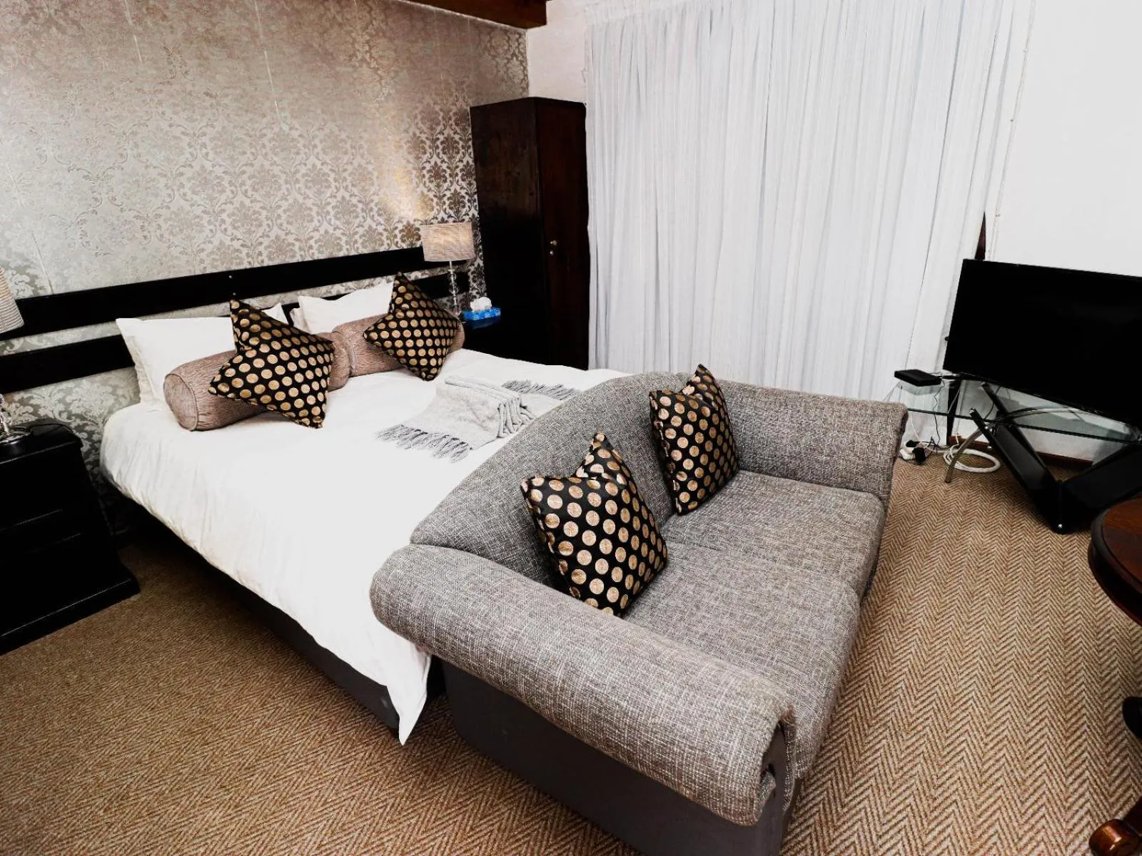 Bed in Casa Blanca Boutique Hotel Pension