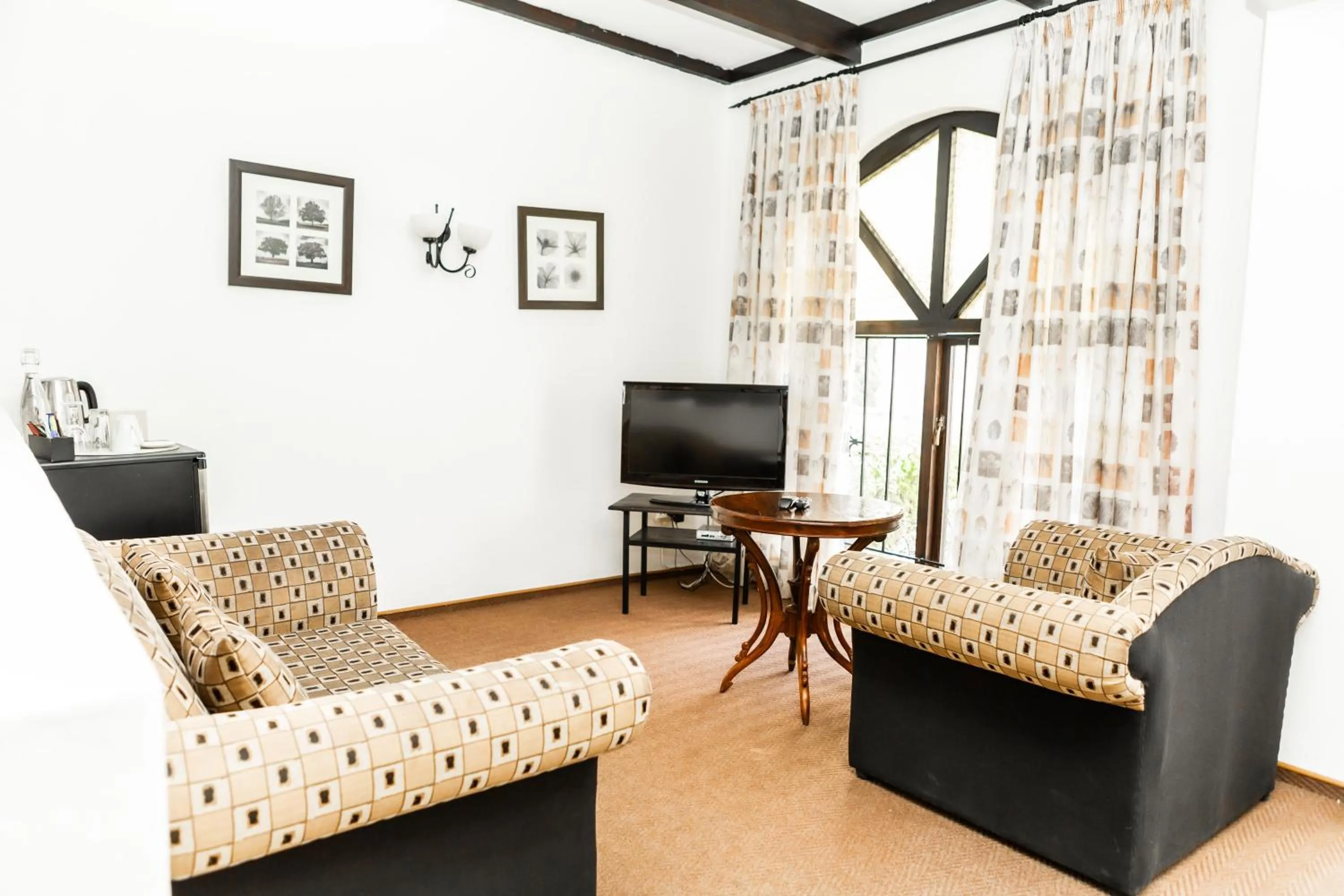 Communal lounge/ TV room in Casa Blanca Boutique Hotel