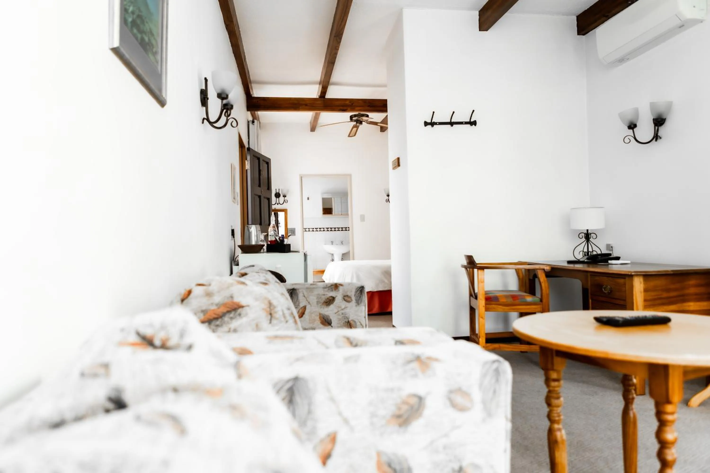 Seating area, Bed in Casa Blanca Boutique Hotel Pension