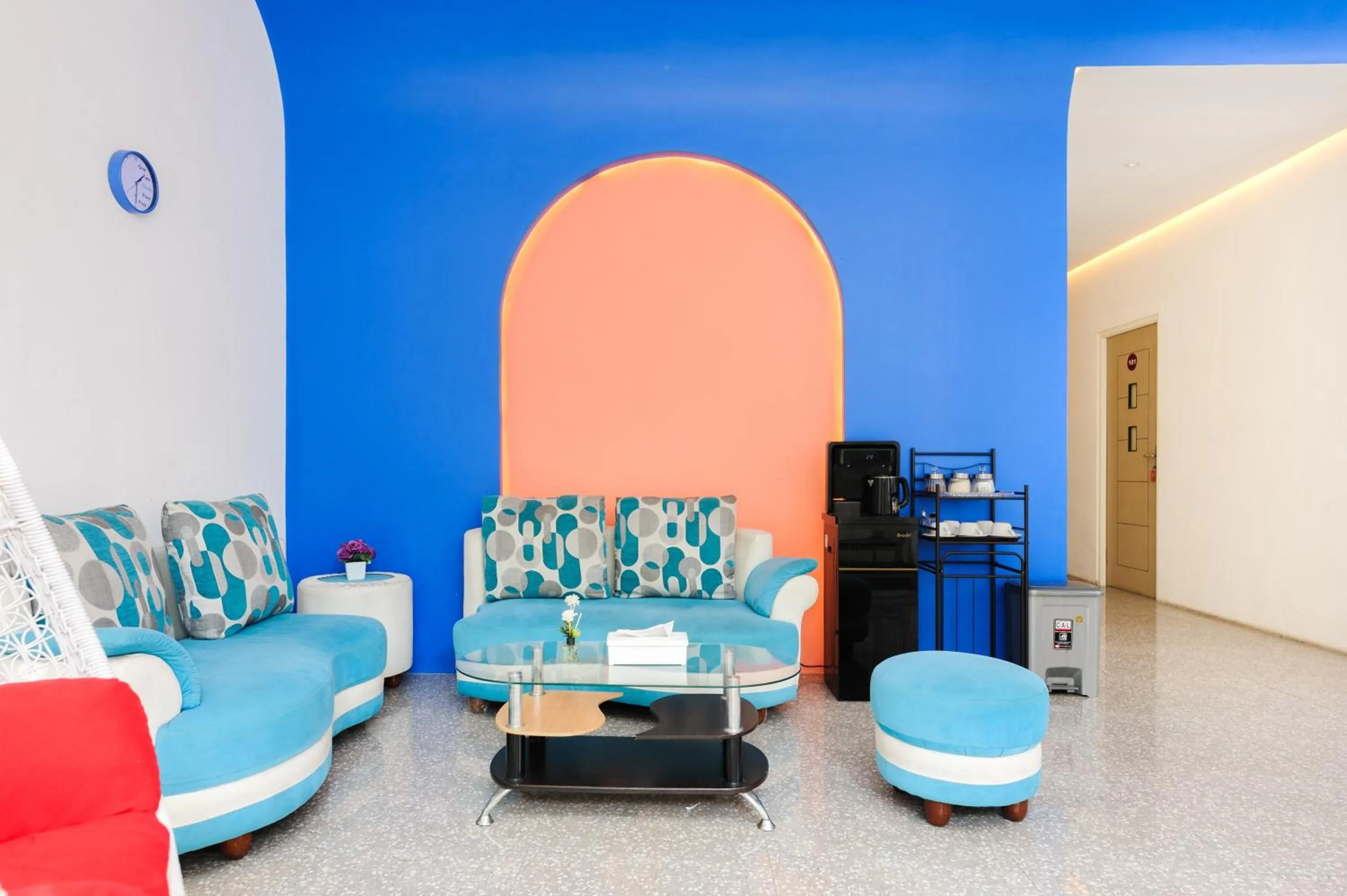 Seating area in Sans Hotel La Vida Malang