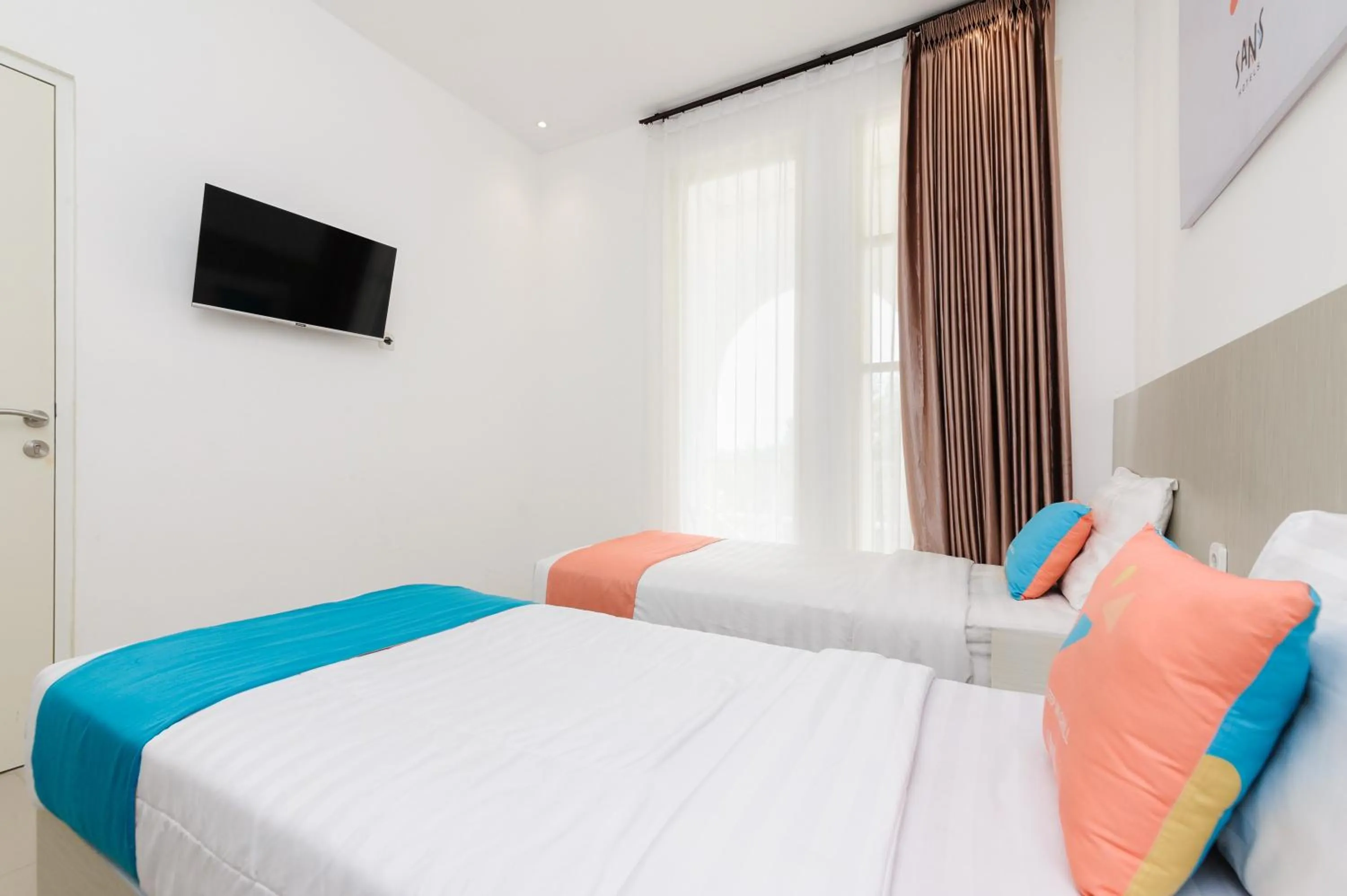 Bedroom, Bed in Sans Hotel La Vida Malang