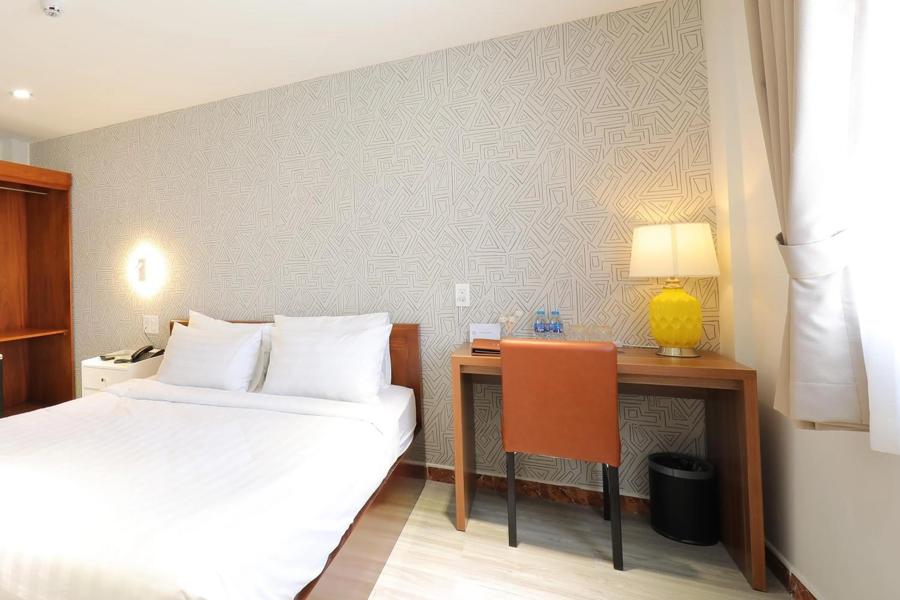 Bed in Lanura Saigon Boutique Hotel