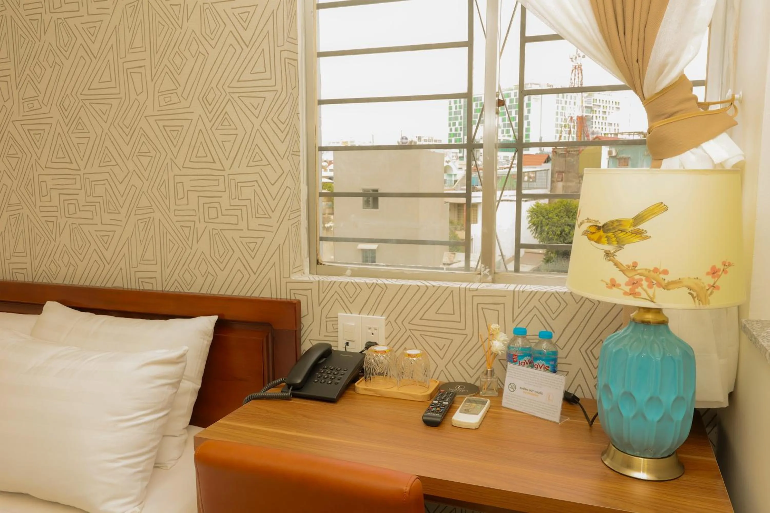 Bedroom in Lanura Saigon Boutique Hotel