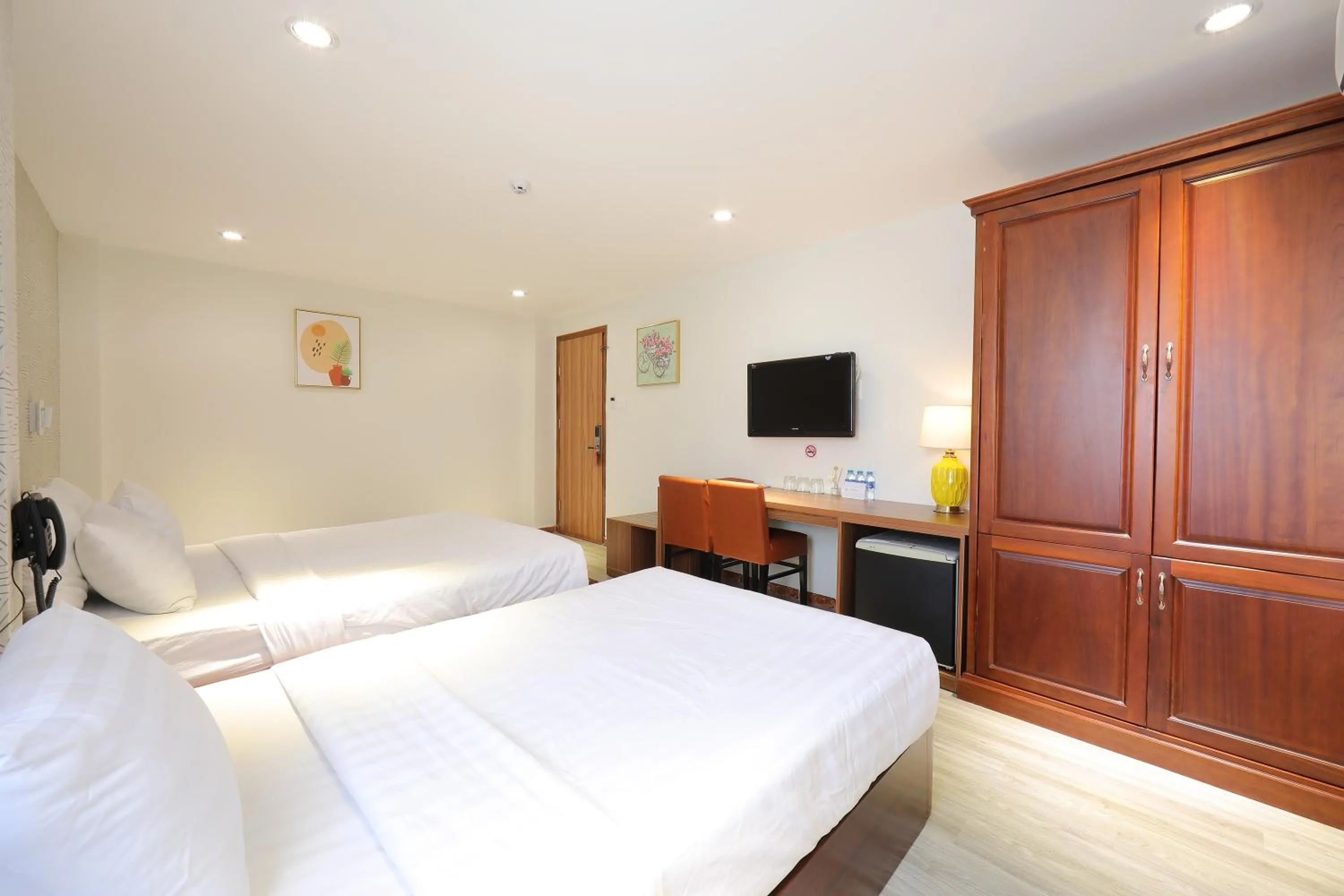 Bed in Lanura Saigon Boutique Hotel