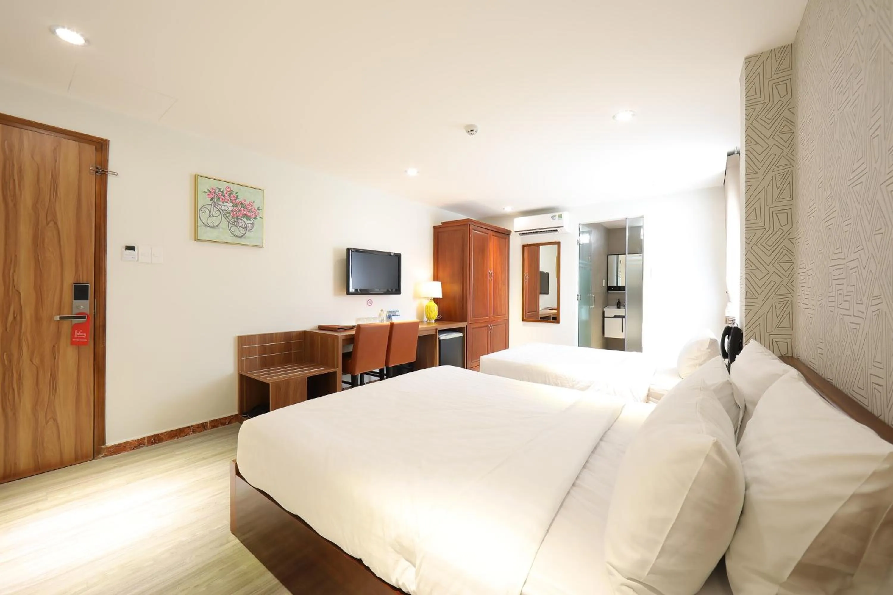 Bed in Lanura Saigon Boutique Hotel