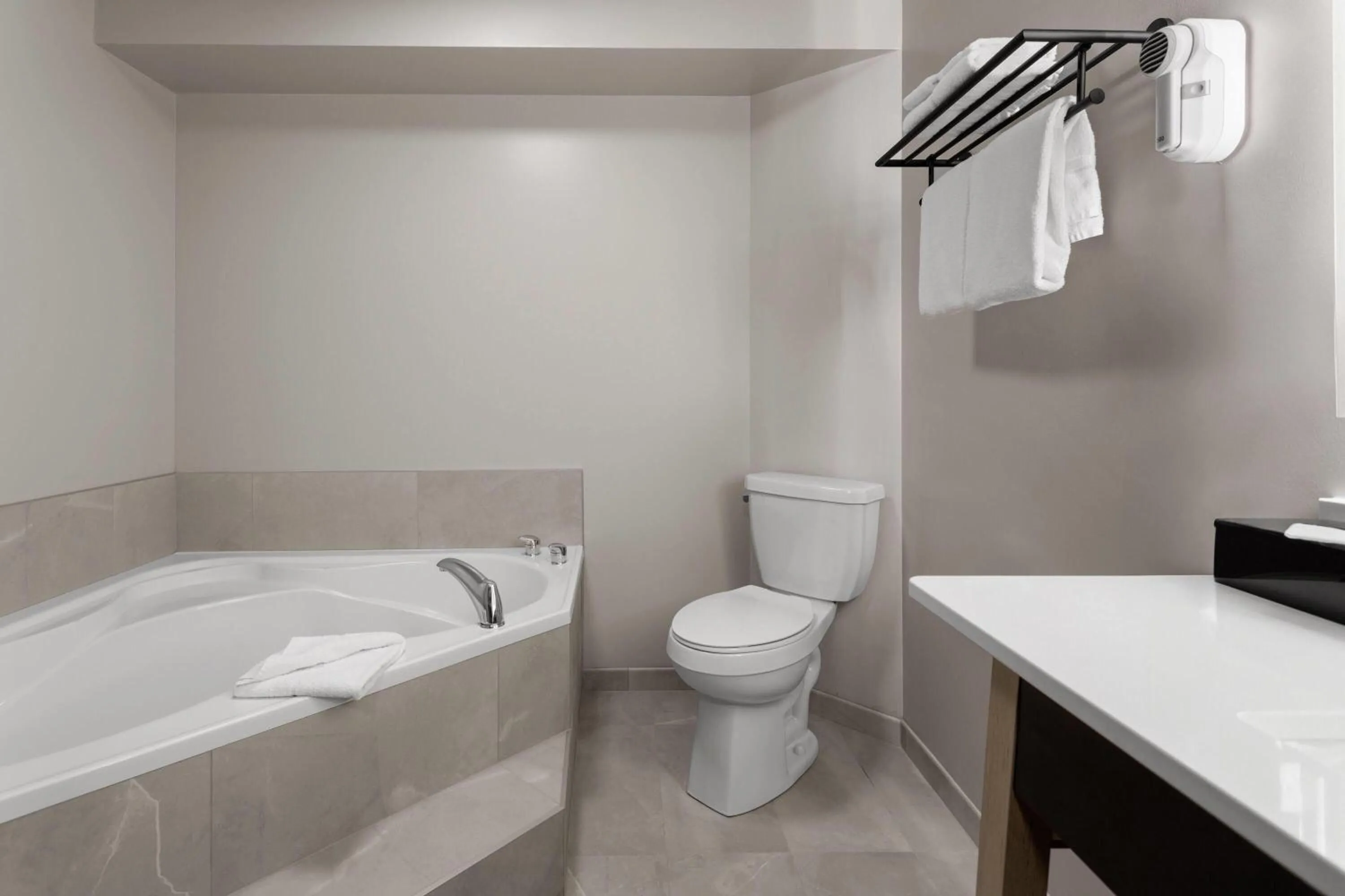 Bathroom in Super 8 by Wyndham Sault Ste Marie On