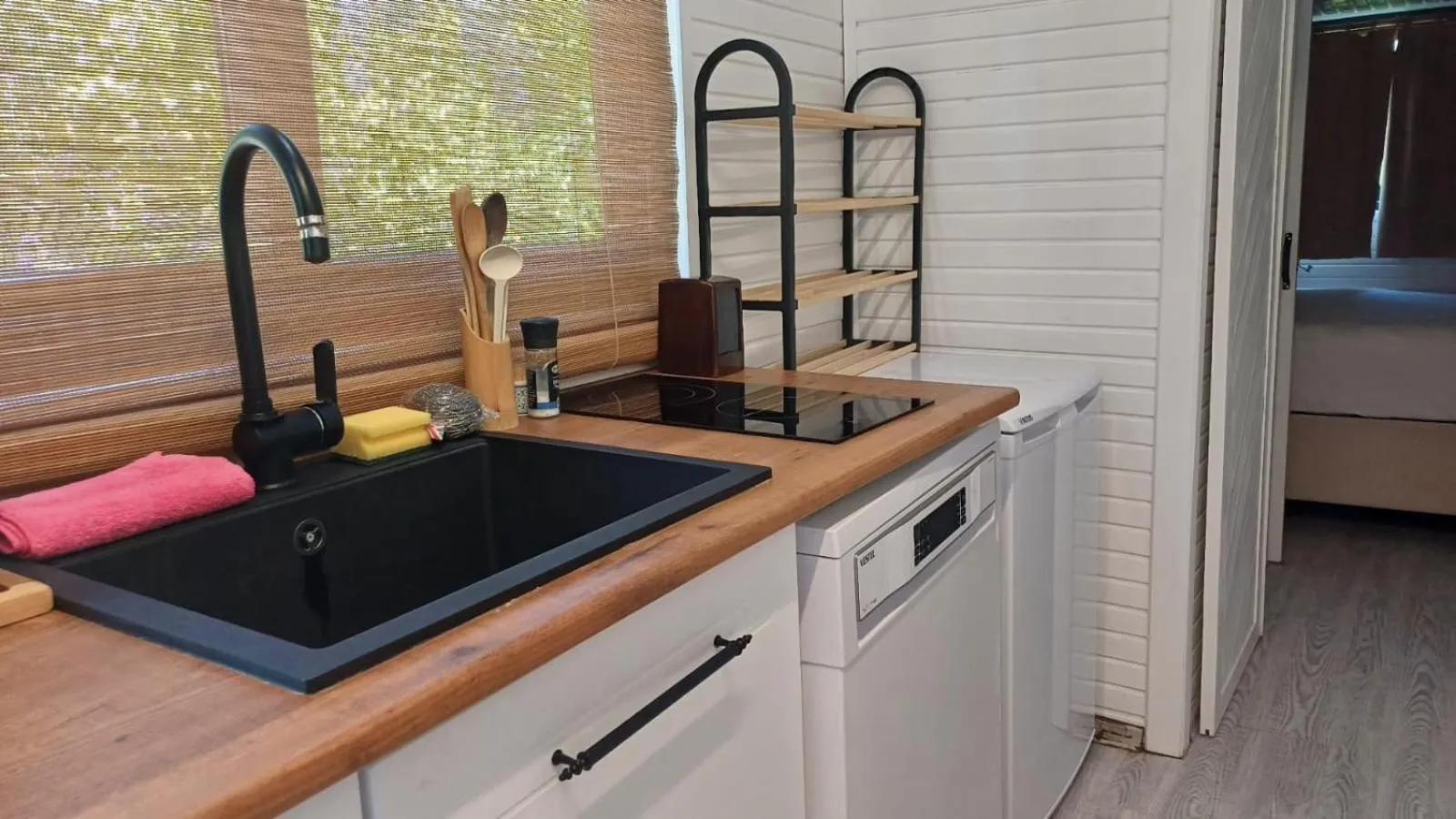 Kitchen or kitchenette in Angels Garden Hotel