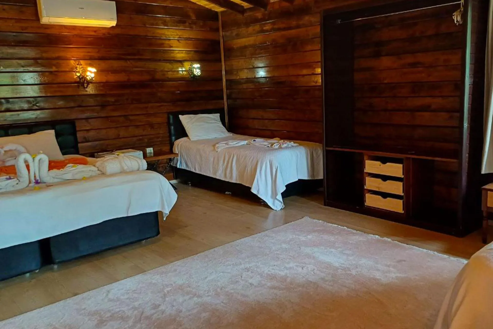 Bed in Angels Garden Hotel