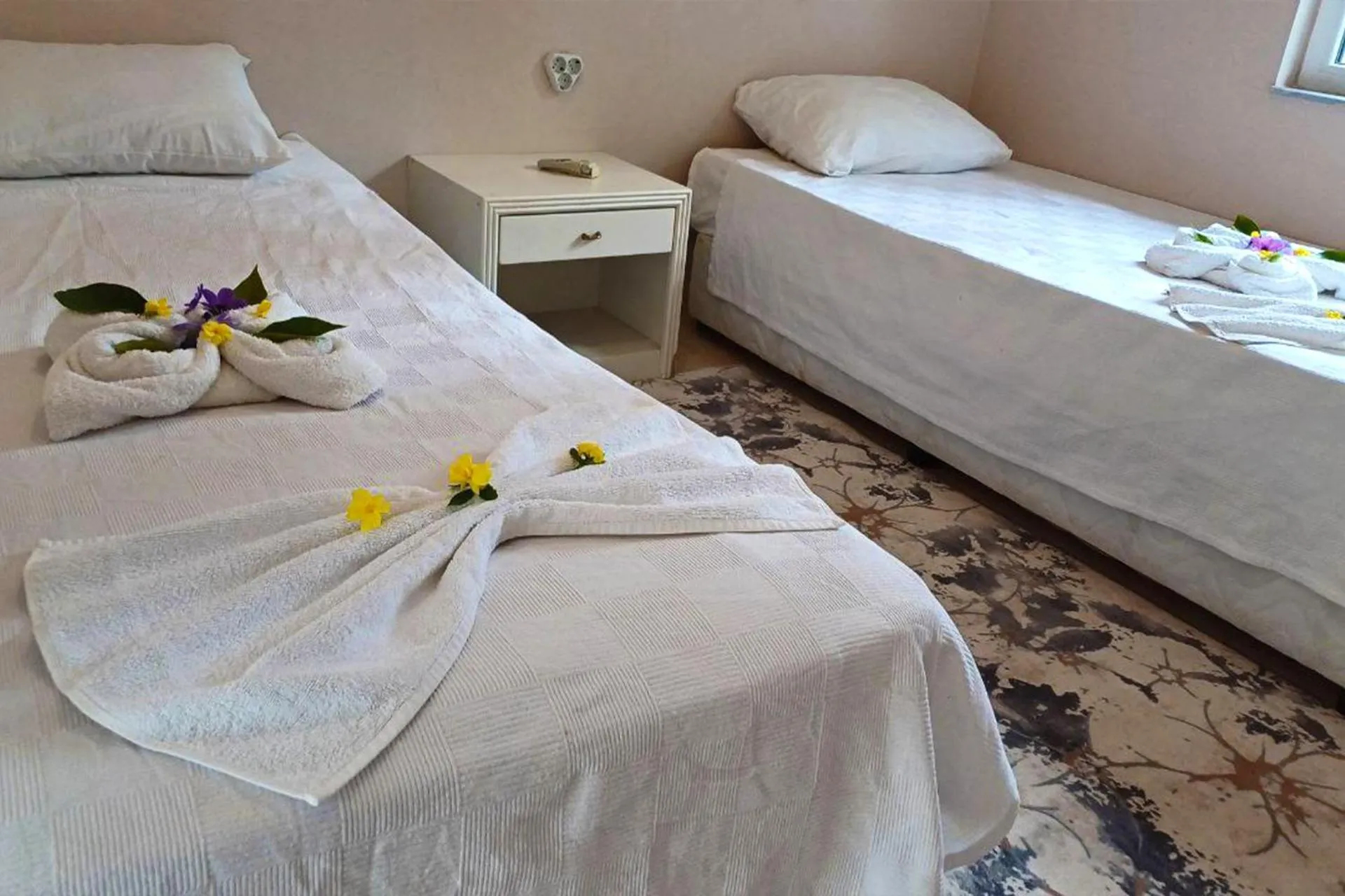 Bed in Angels Garden Hotel